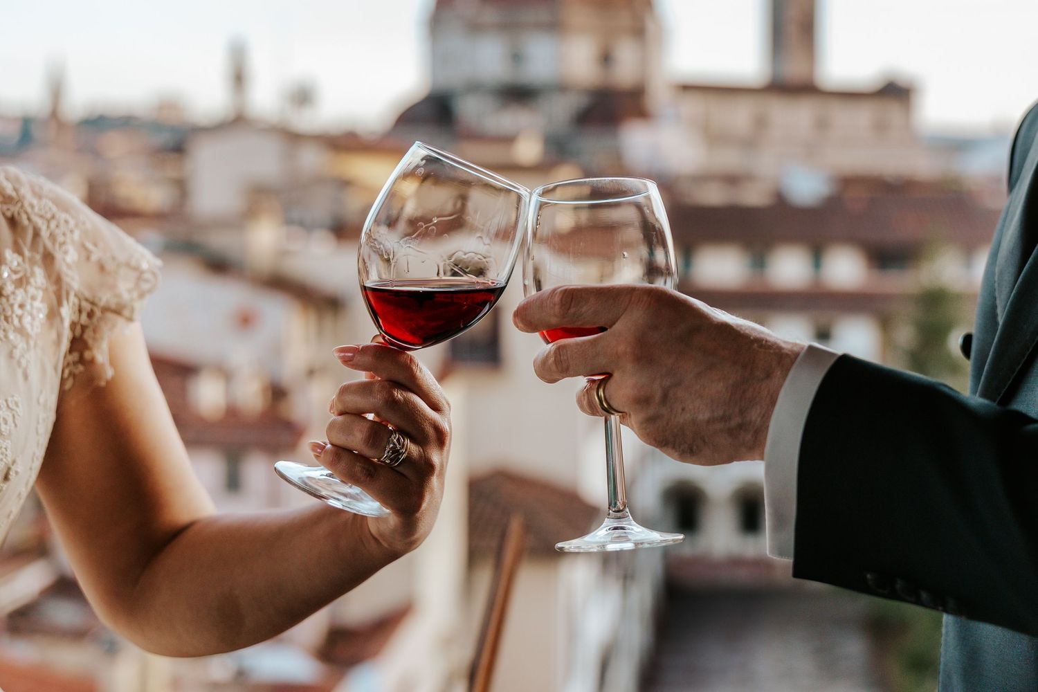 elopement in chianti, italy drinking wine with a gorgeous view