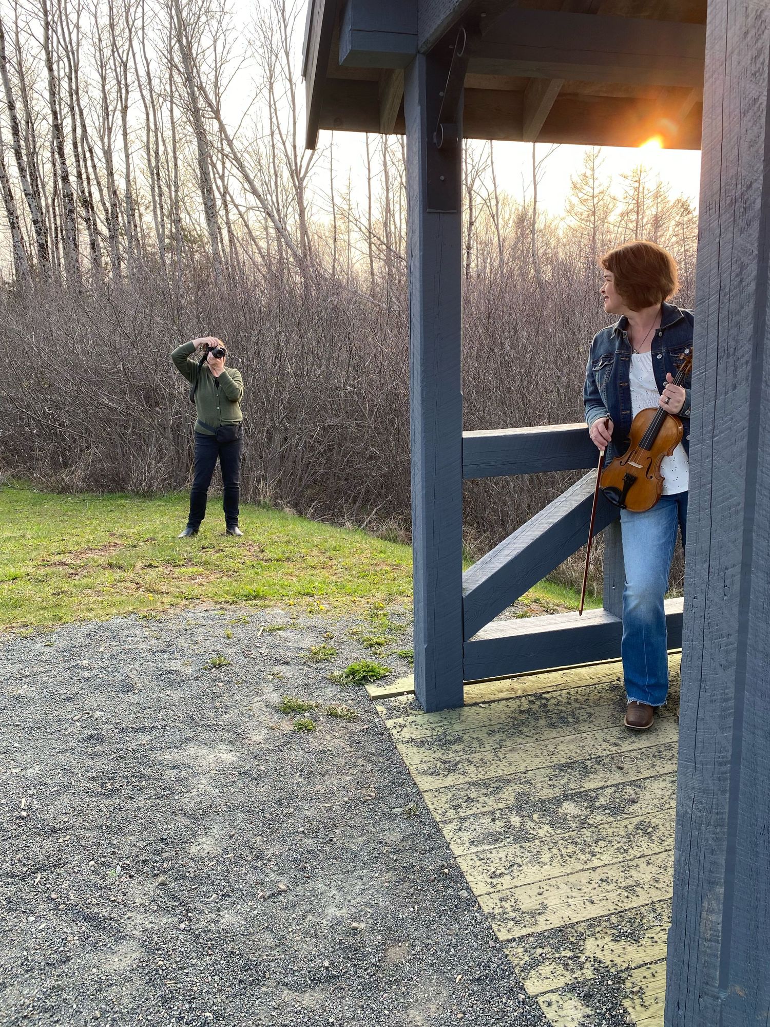 Taking a photo of a fiddle player at the entrance to Victoria Park at the top of Wood Street, Truro, N.S.