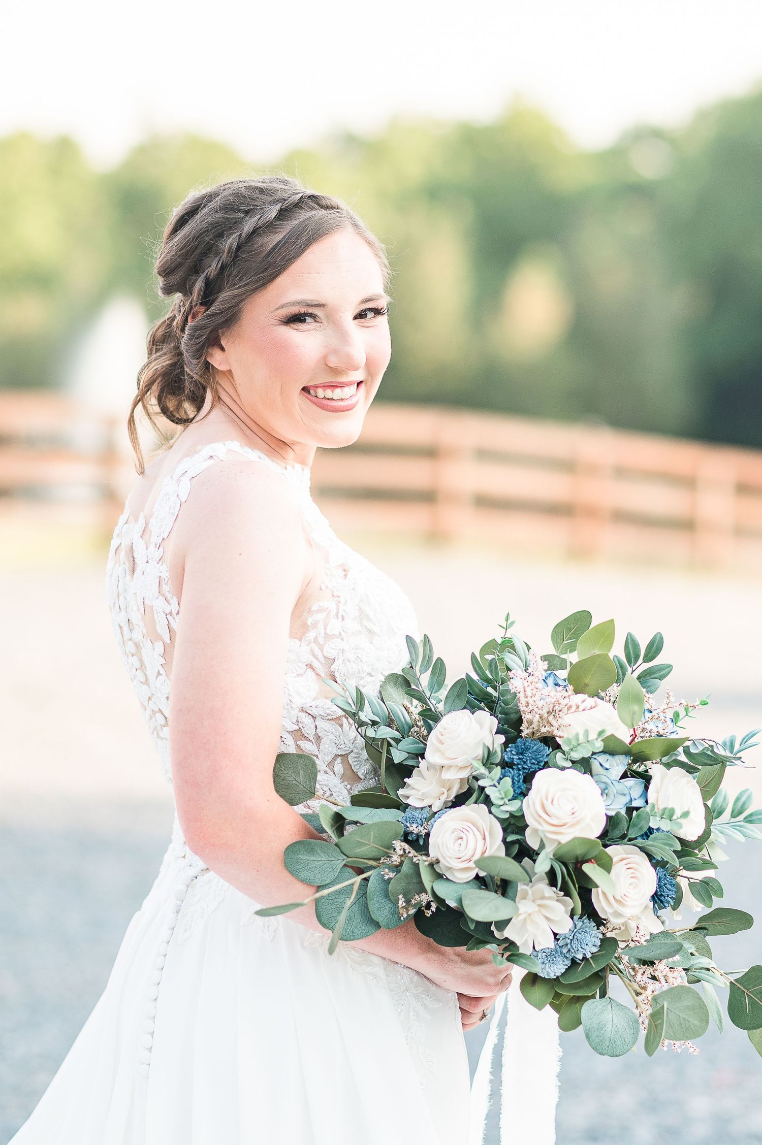Bride with blue and white bouquet