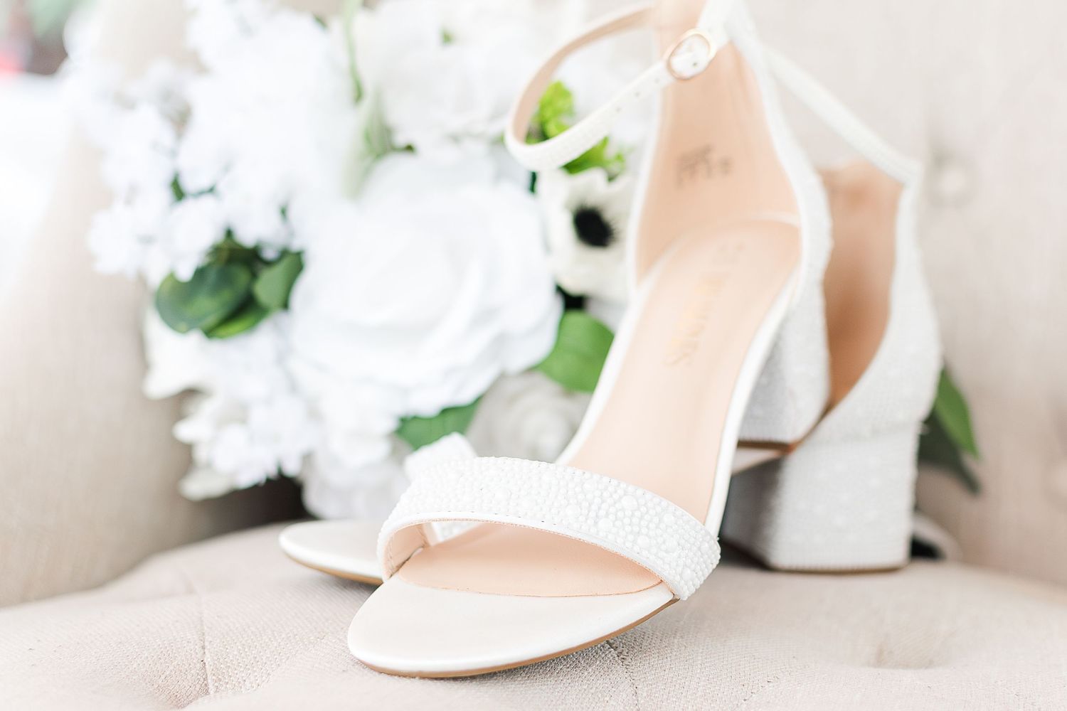 Bridal shoes and bouquet