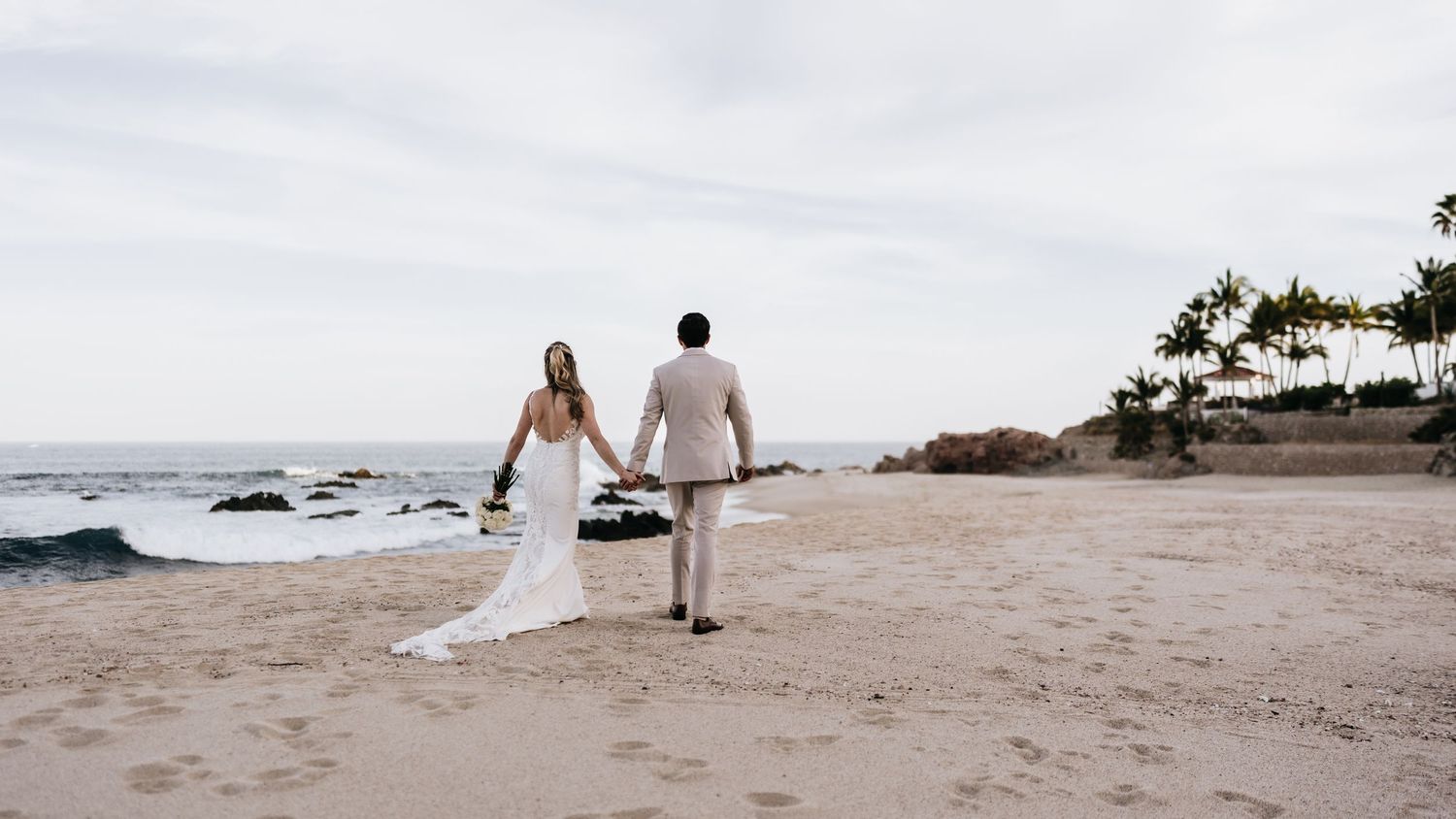 Bride and groom on beach in Cabo, Mexico shot by David Jesse Photo