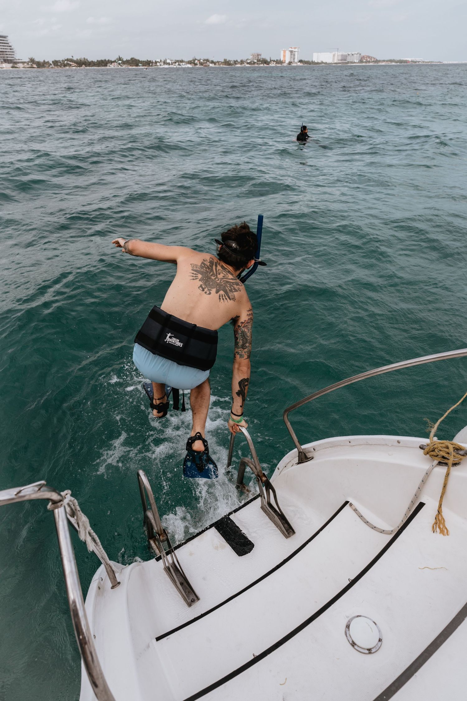 Destination wedding, snorkeling  Trip to  Isla Mujeras, David Jesse Photo wedding photographer