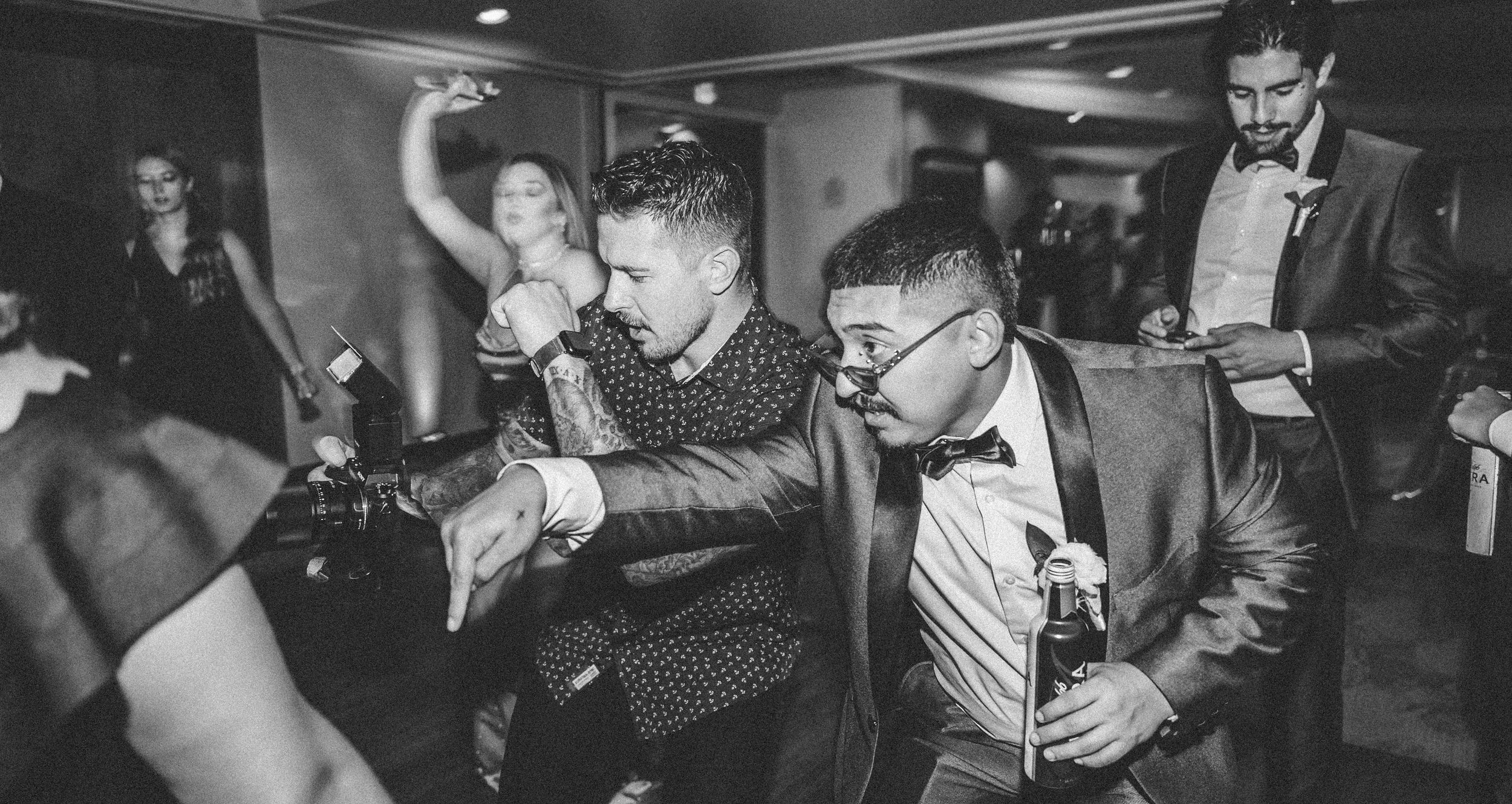 Wedding guests dancing at a reception