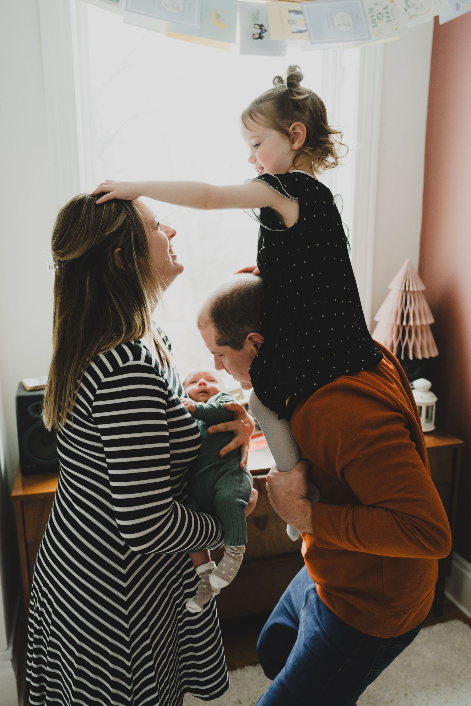 Three candid shots of people dancing and moving together in a bright interior space.