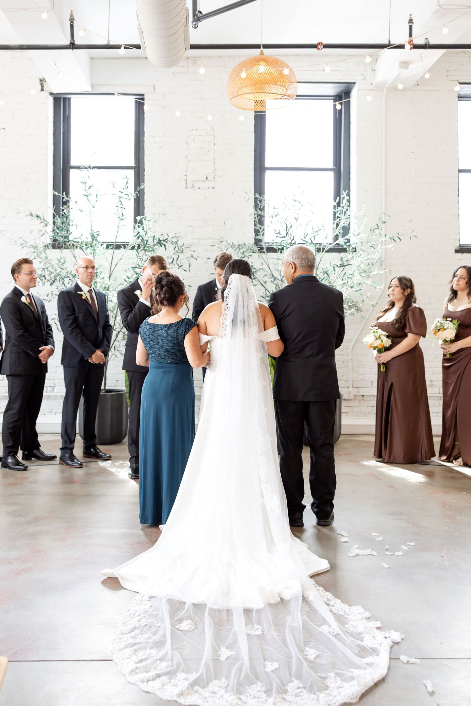 Bride and groom celebrating their Flat 51 wedding in downtown Columbus, Ohio, captured with timeless, light and airy wedding photography.