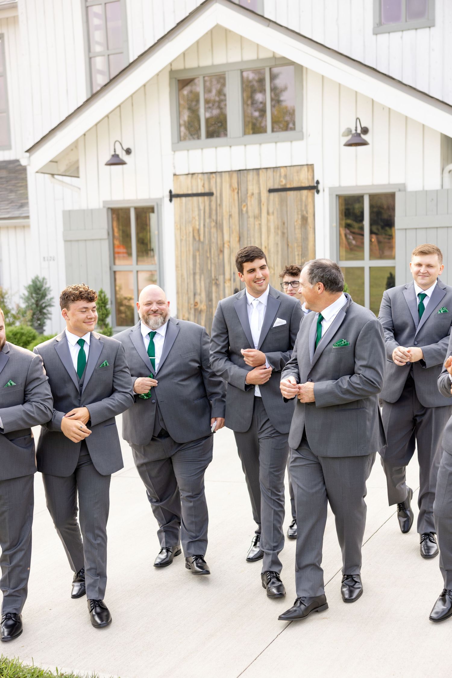 Timeless wedding photography at The Bicentennial Barn in Dayton, Ohio, featuring a joyful Cedarville University couple on their wedding day.