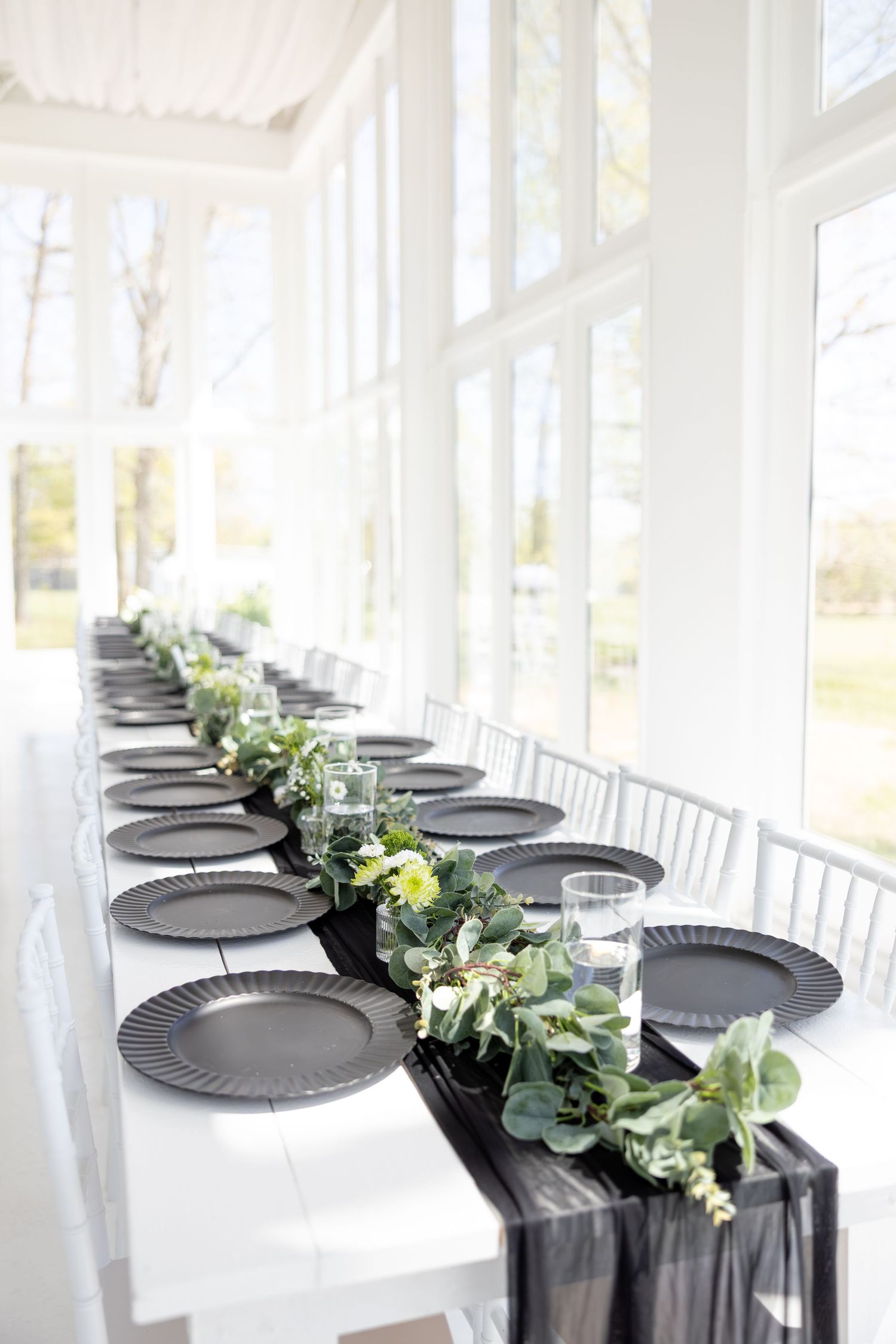 Light and airy wedding photos at The Glass House near Huntsville, Alabama capturing joyful, timeless moments of a bride and groom