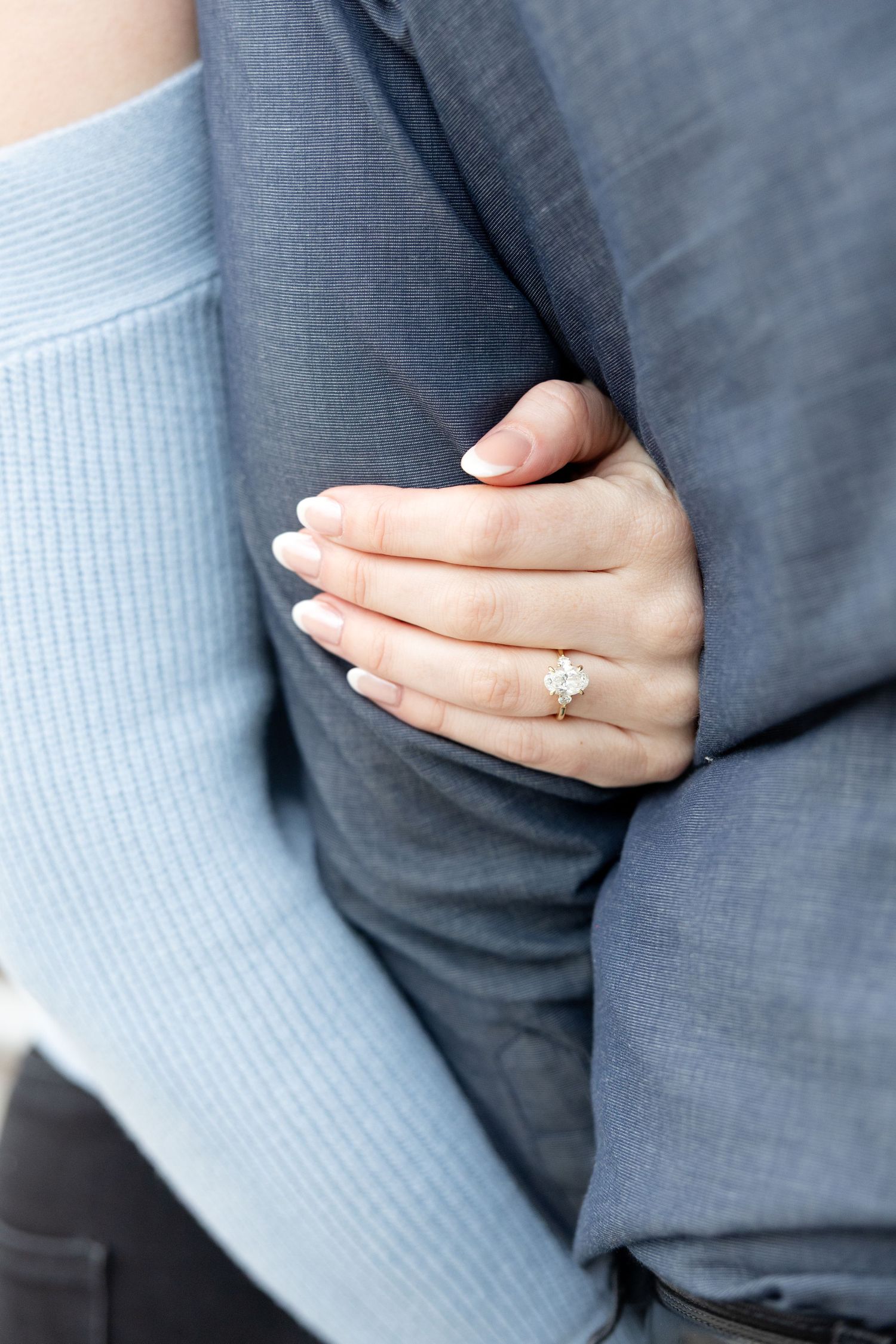 Downtown Columbus engagement photos on Main Street Bridge with a joyful couple in a light and airy style