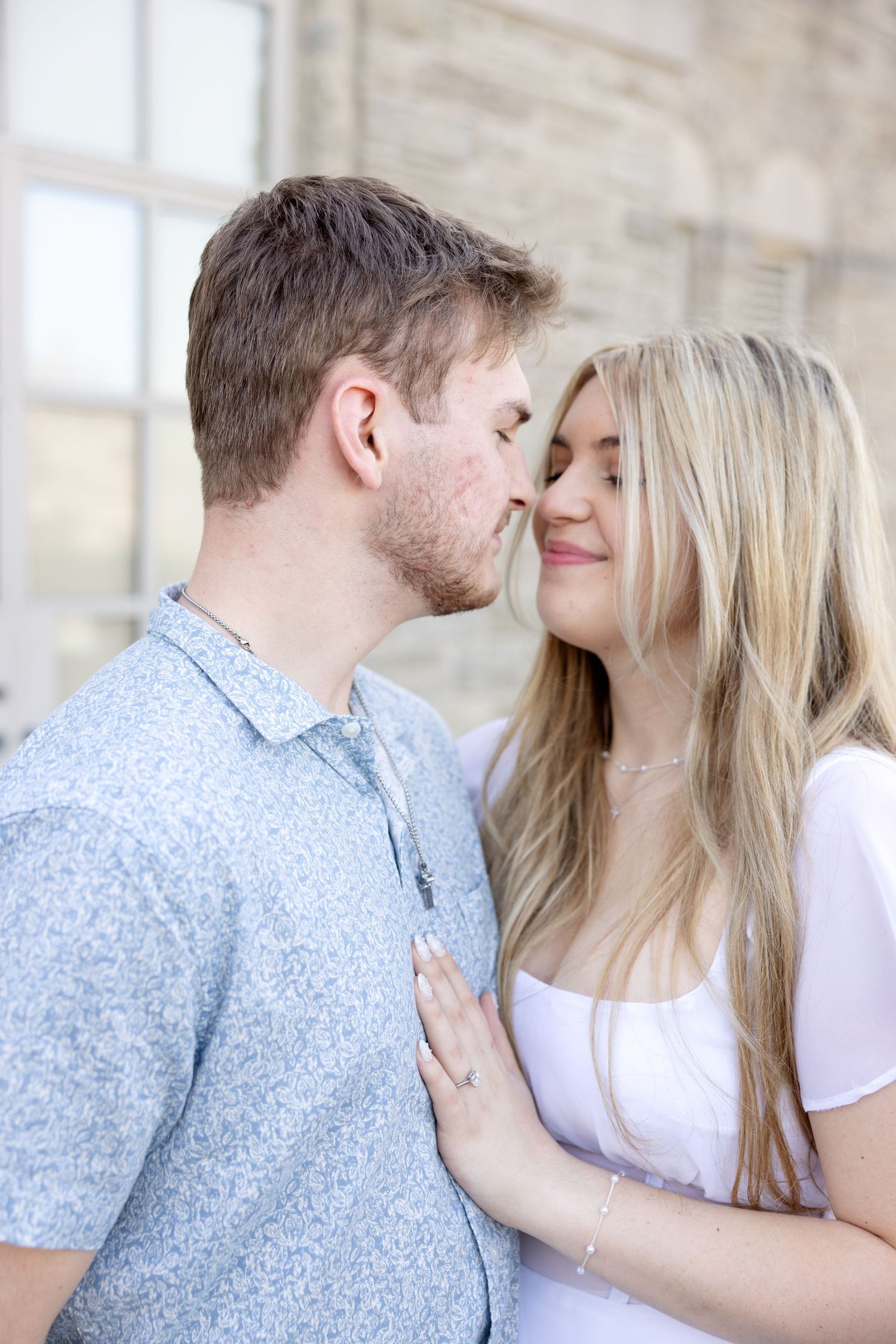 Cincinnati engagement session at Ault Park with light and airy style, capturing joyful, natural moments in a spring park setting