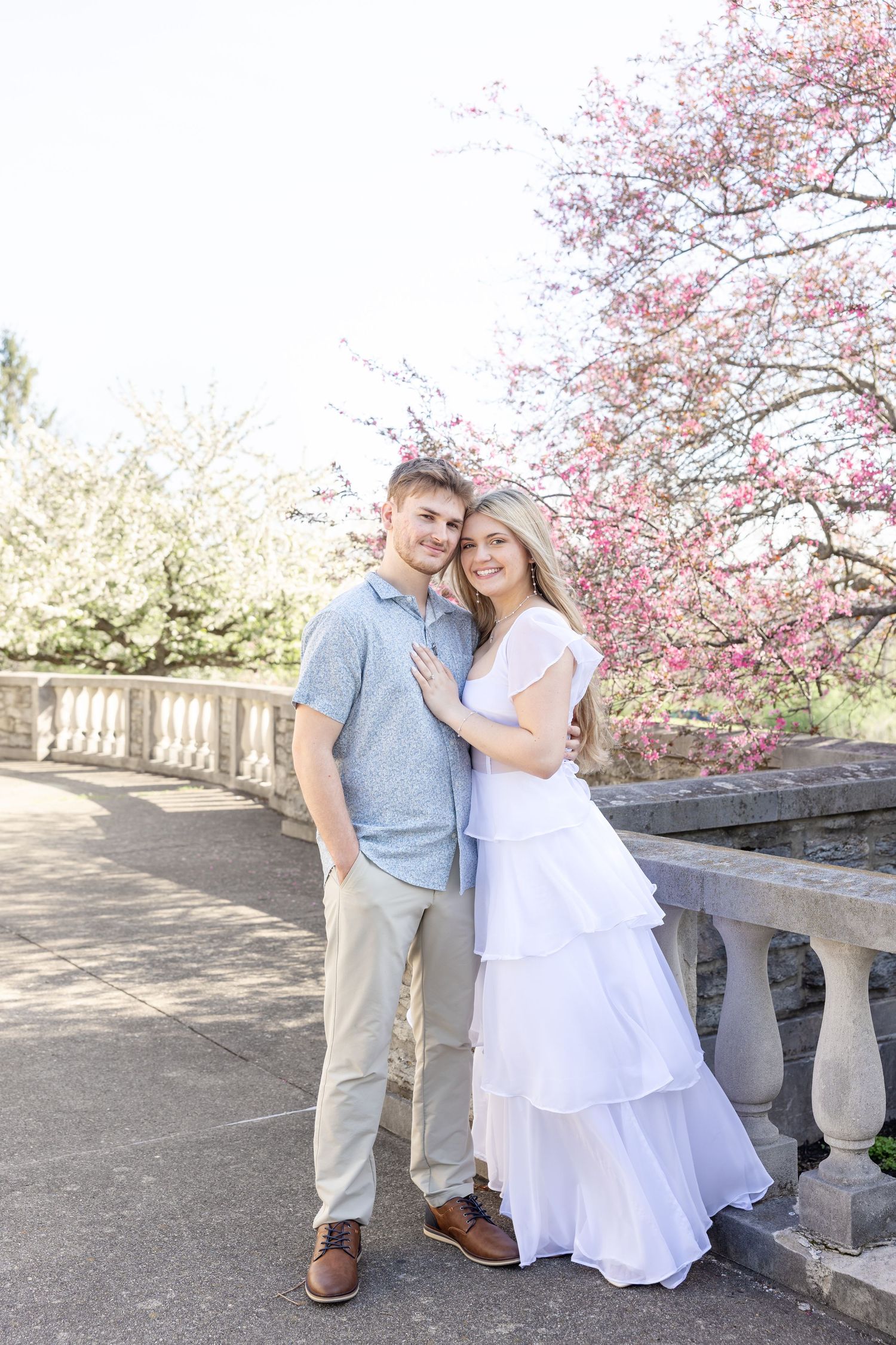 Cincinnati engagement session at Ault Park with light and airy style, capturing joyful, natural moments in a spring park setting