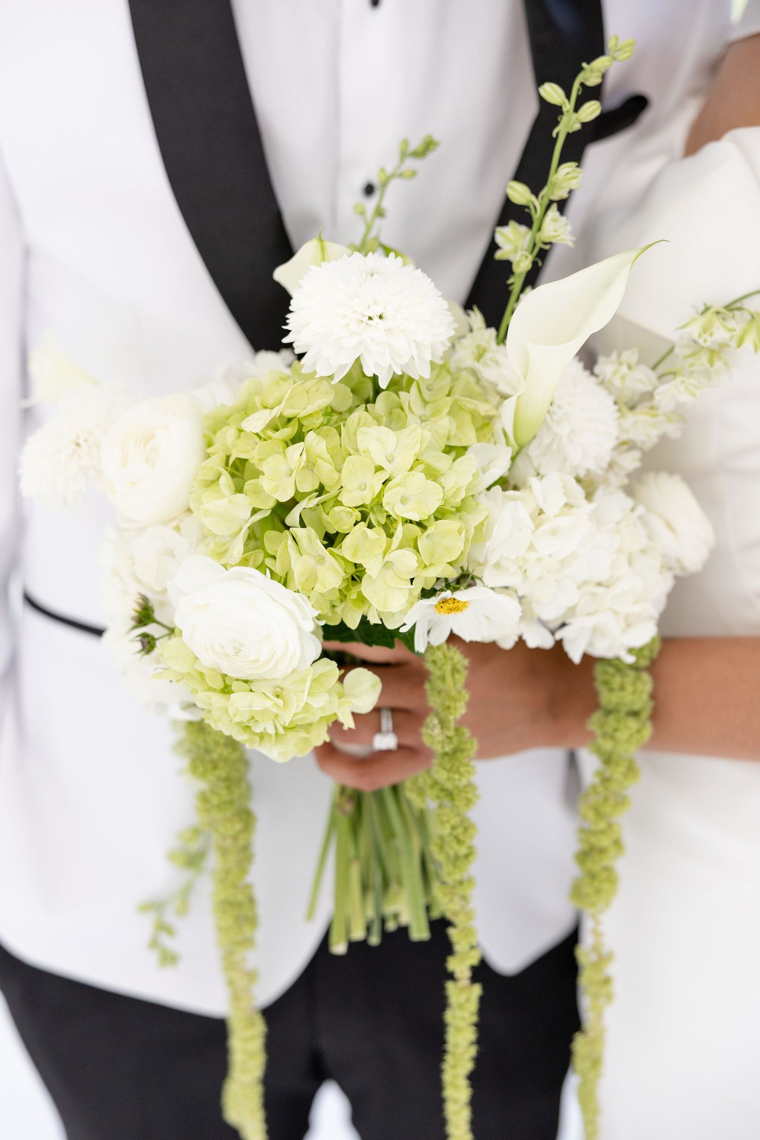 Light and airy wedding photos at The Glass House near Huntsville, Alabama capturing joyful, timeless moments of a bride and groom