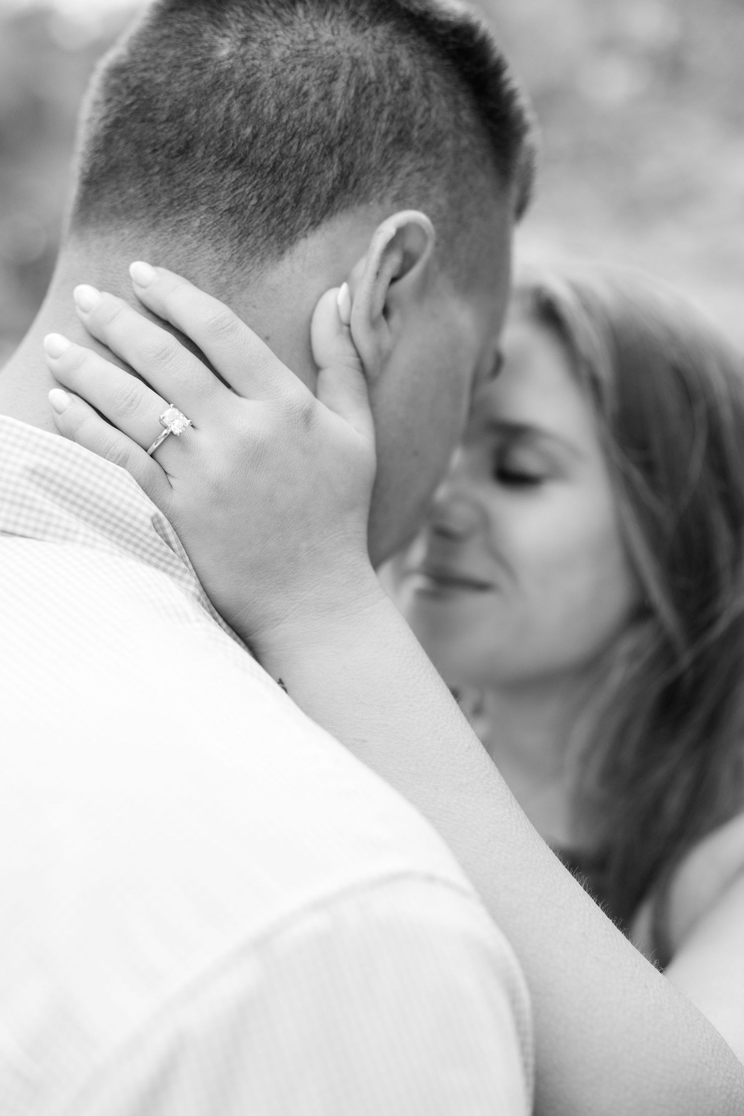 Downtown Huntsville engagement session at First National Bank and Big Spring Park by Julia and Sean Photography, capturing joyful moments.