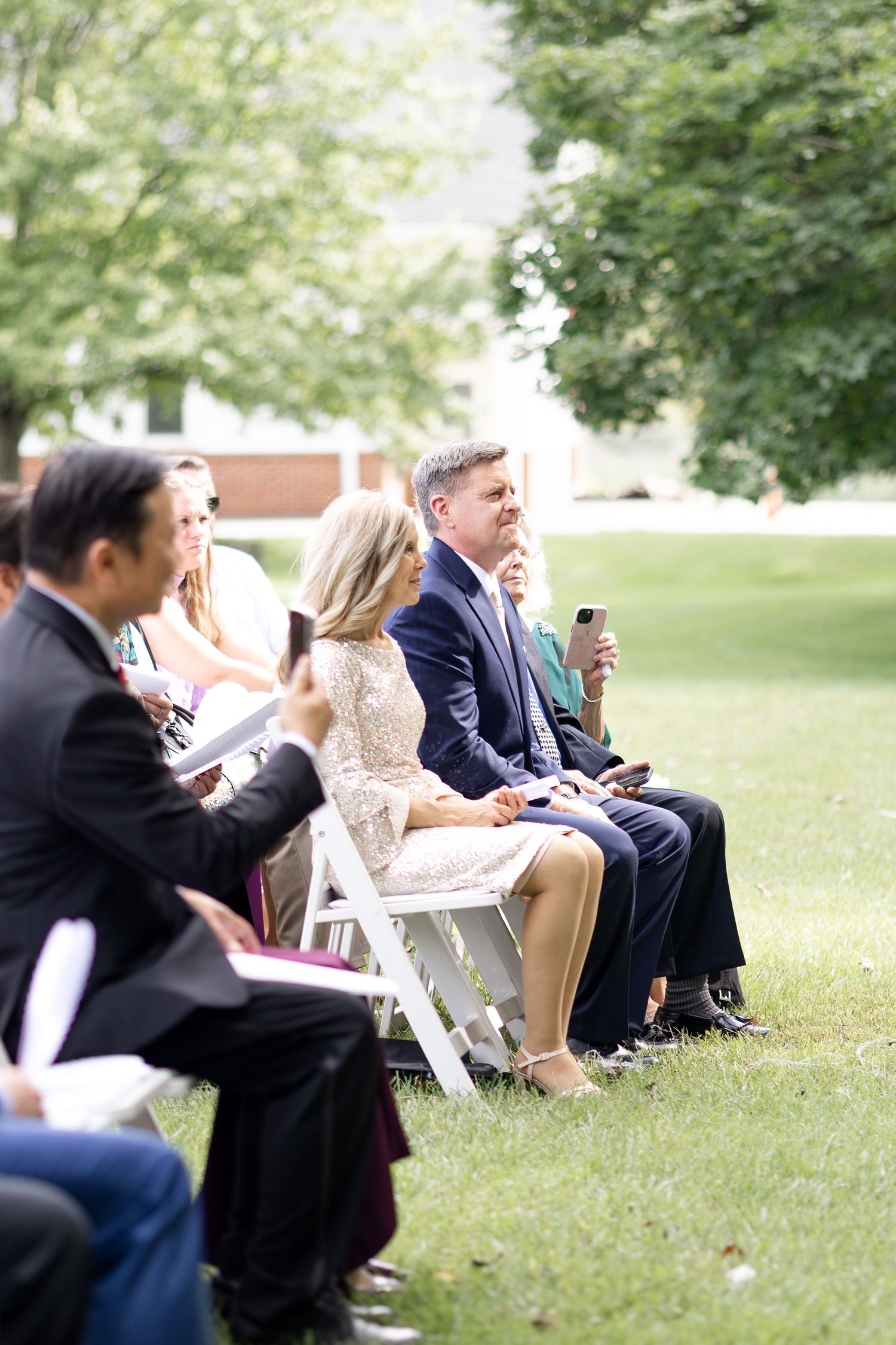 Outdoor wedding ceremony at The Estate at Sunset Farm in Bellbrook, Ohio, captured by Dayton wedding photographers Julia & Sean Photography