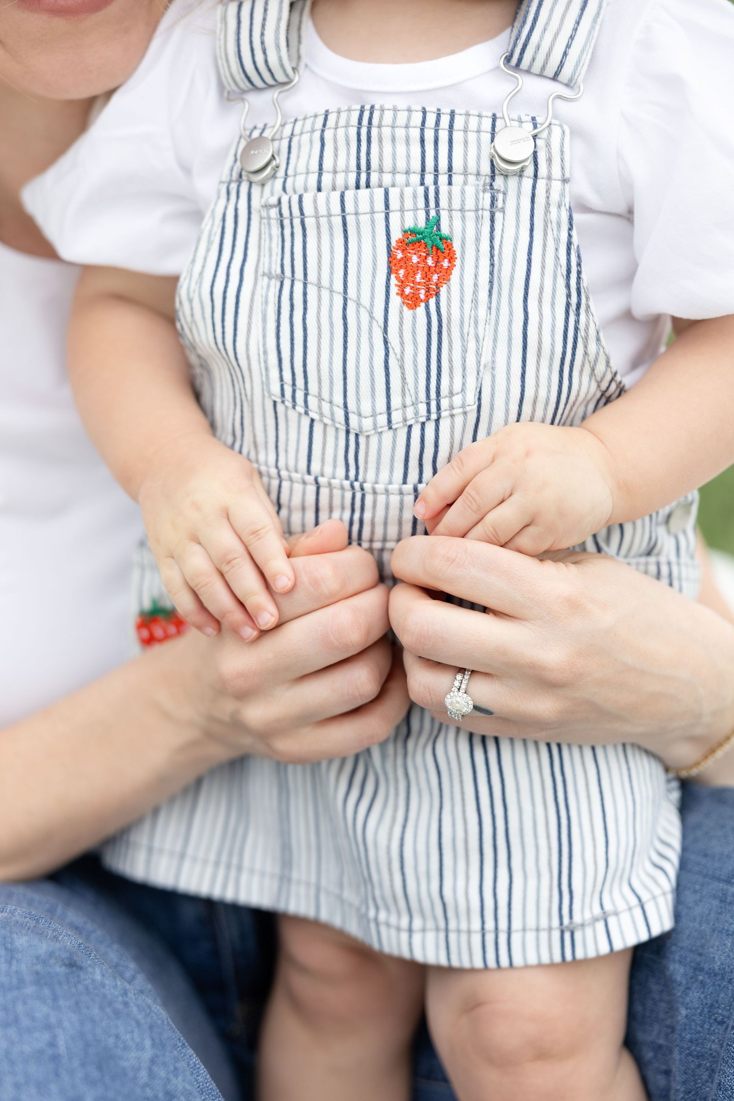 Joyful motherhood photos at Carillon Park in Dayton Ohio captured by Julia and Sean Photography during a soft spring day