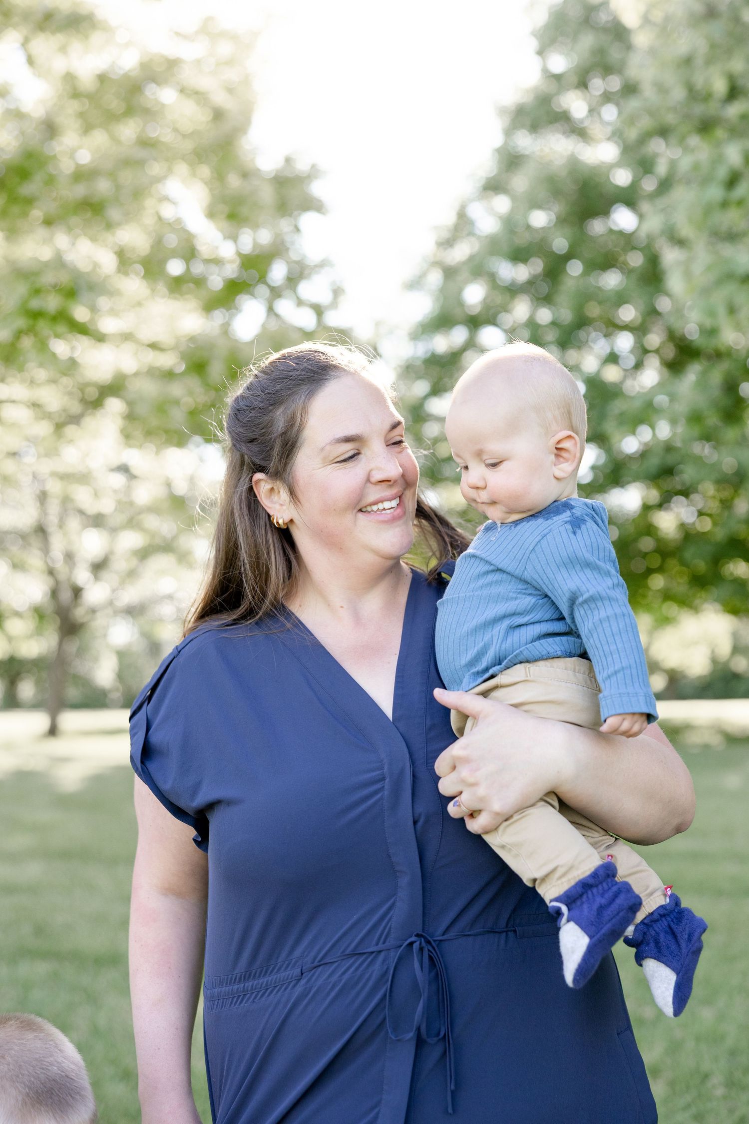 Joyful motherhood photos at Carillon Park in Dayton Ohio captured by Julia and Sean Photography during a soft spring day