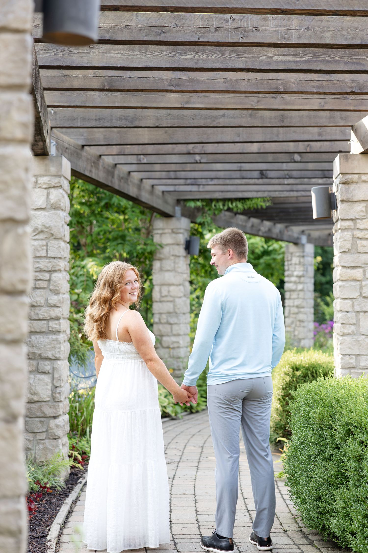 Engagement portraits at Wegerzyn Gardens engagement session, Dayton, Ohio captured by Ohio wedding photographers Julia and Sean Photography