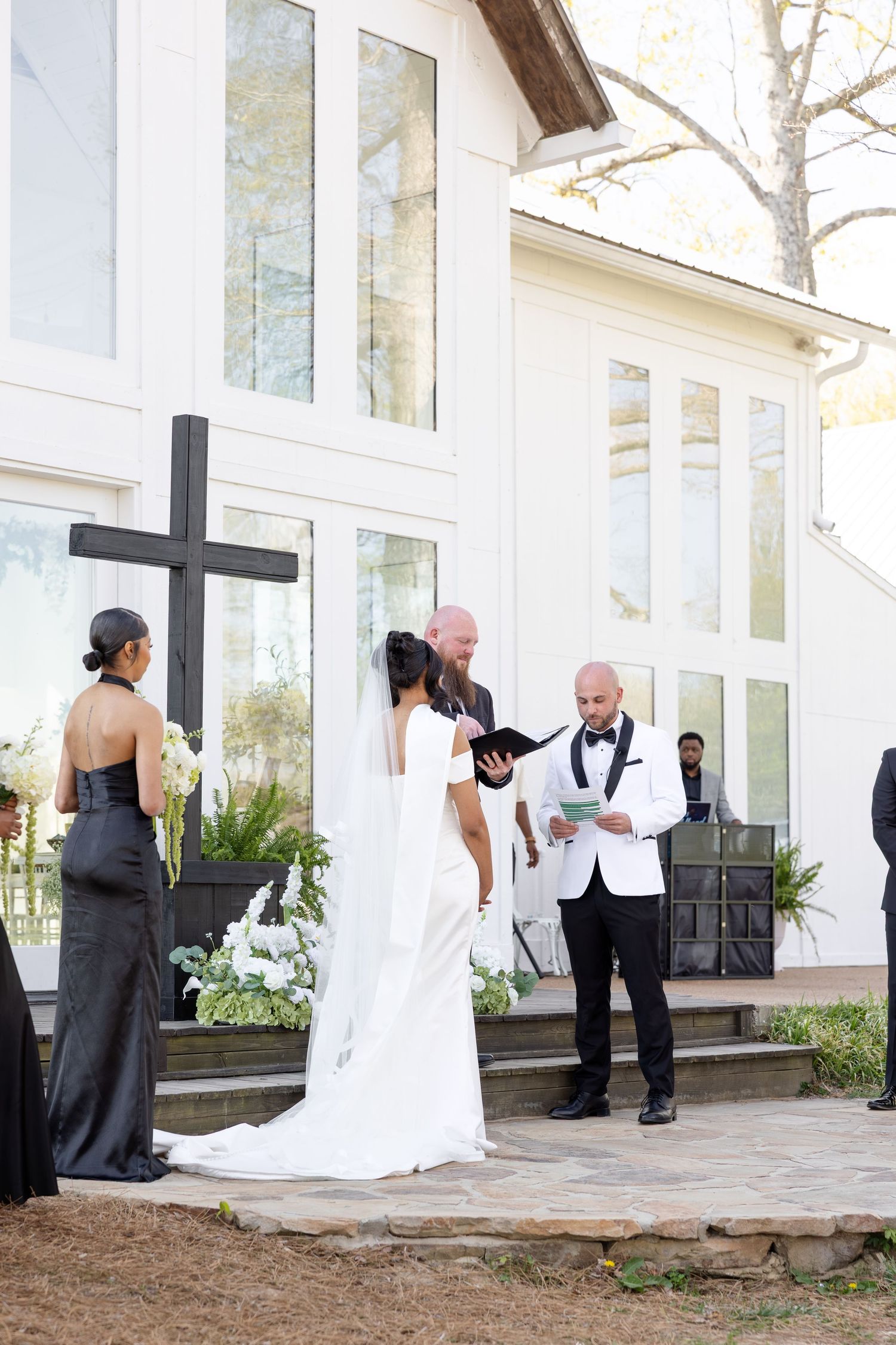 Elegant Glass House wedding near Huntsville, Alabama with natural light, romantic portraits, and faith-filled ceremony moments