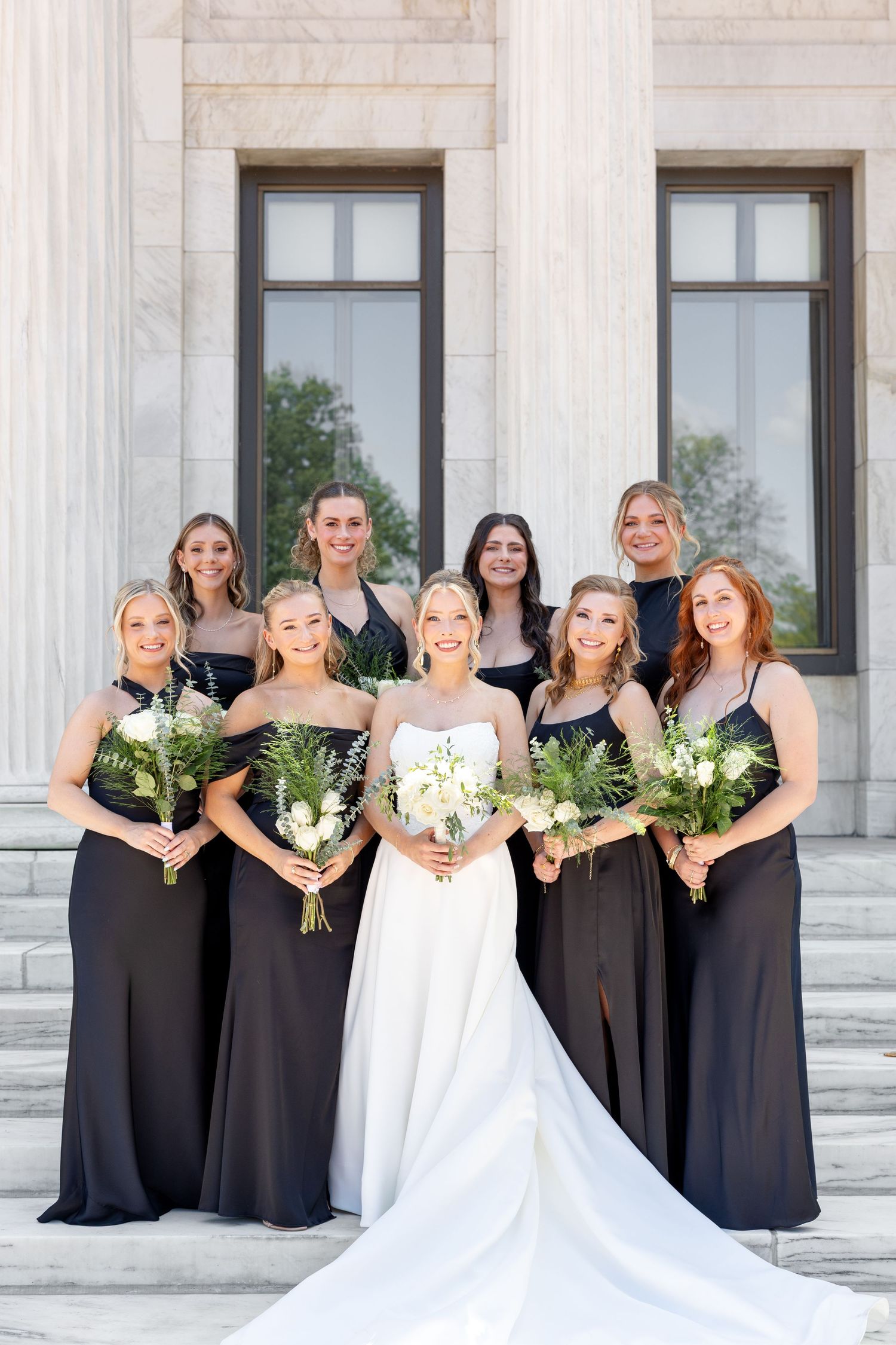 Bride and groom portraits at the Toledo Museum of Art before a Toledo Zoo wedding in Toledo, Ohio photographed by Julia & Sean Photography