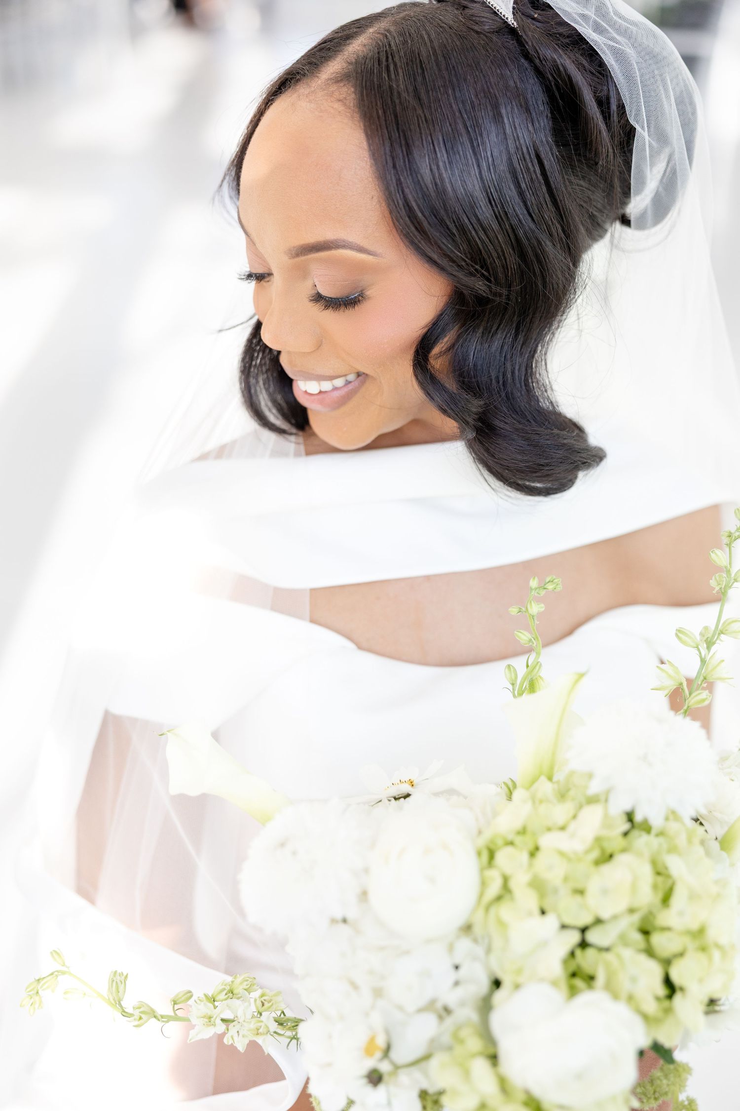 Light and airy wedding photos at The Glass House near Huntsville, Alabama capturing joyful, timeless moments of a bride and groom