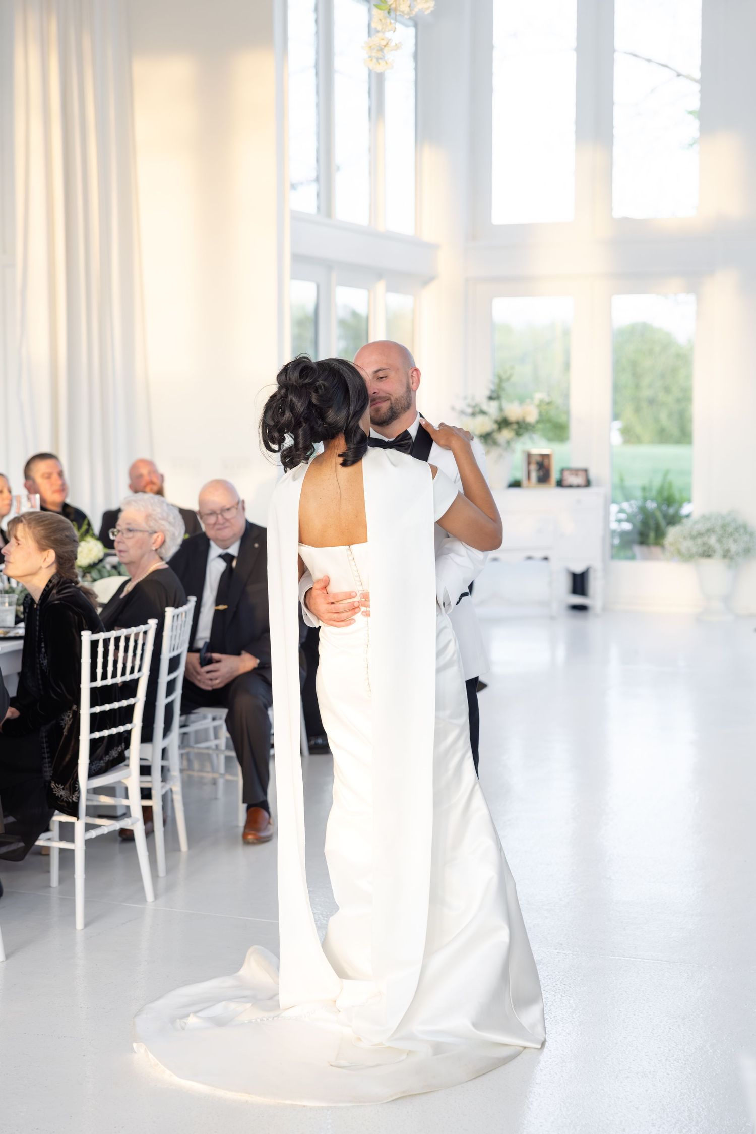Light and airy wedding photos at The Glass House near Huntsville, Alabama capturing joyful, timeless moments of a bride and groom