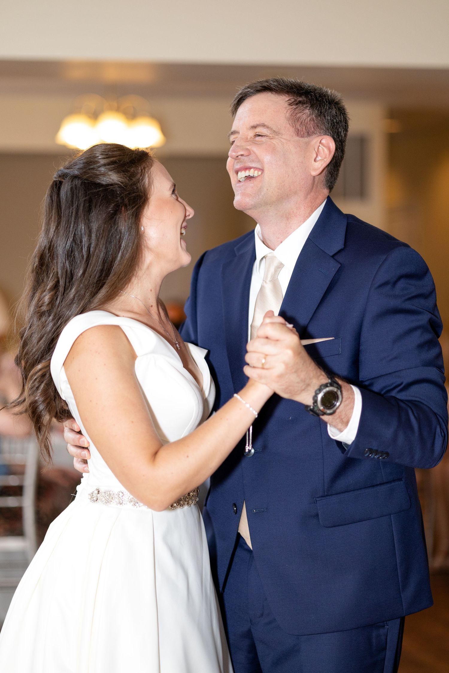 Joyful wedding reception and group dancing at The Estate at Sunset Farm in Bellbrook, Ohio, photographed by Julia and Sean Photography