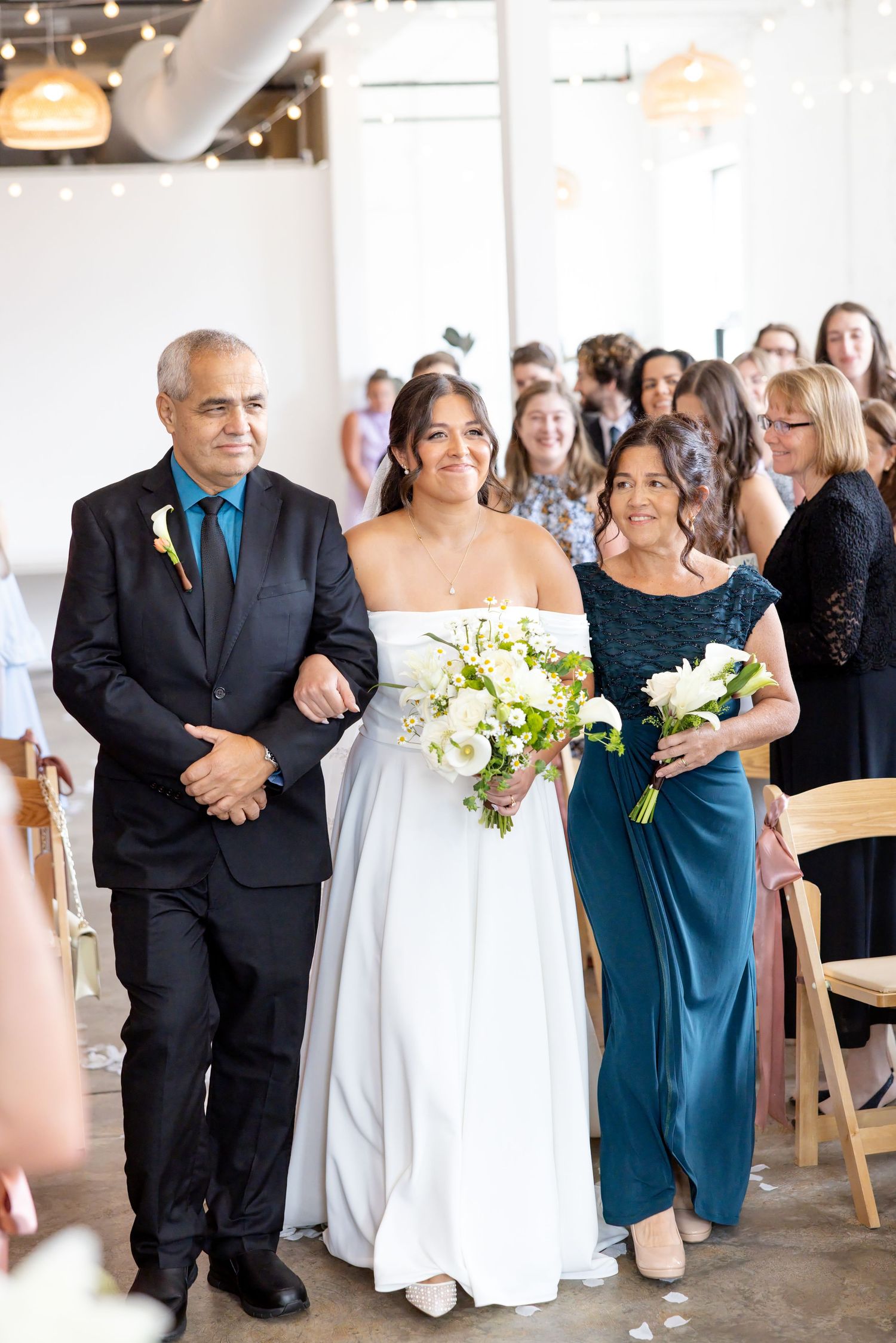 Bride and groom celebrating their Flat 51 wedding in downtown Columbus, Ohio, captured with timeless, light and airy wedding photography.