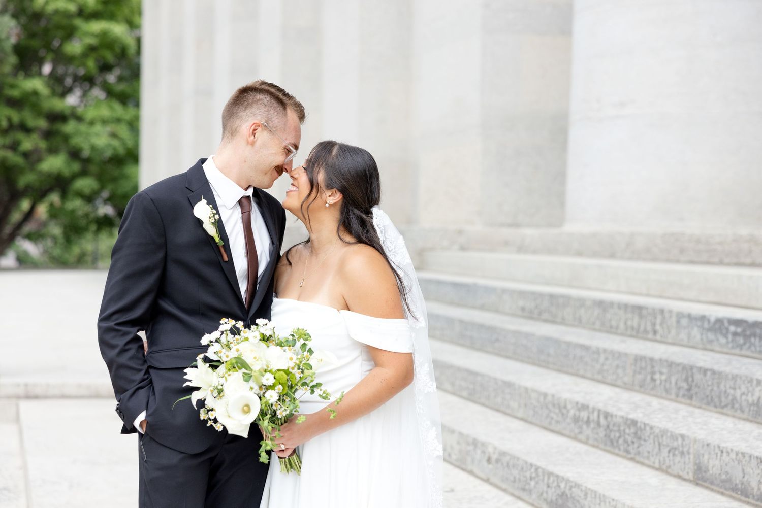 Bride and groom portraits at the Ohio Statehouse in downtown Columbus, Ohio, captured with timeless, light and airy wedding photography.