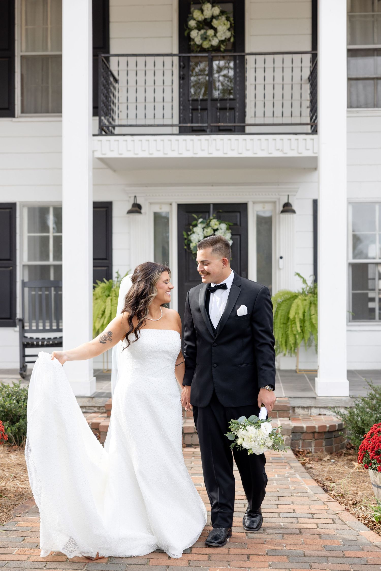 Elegant wedding at The Upton House in Guntersville, Alabama featuring a joyful bride and groom and timeless southern elegance.