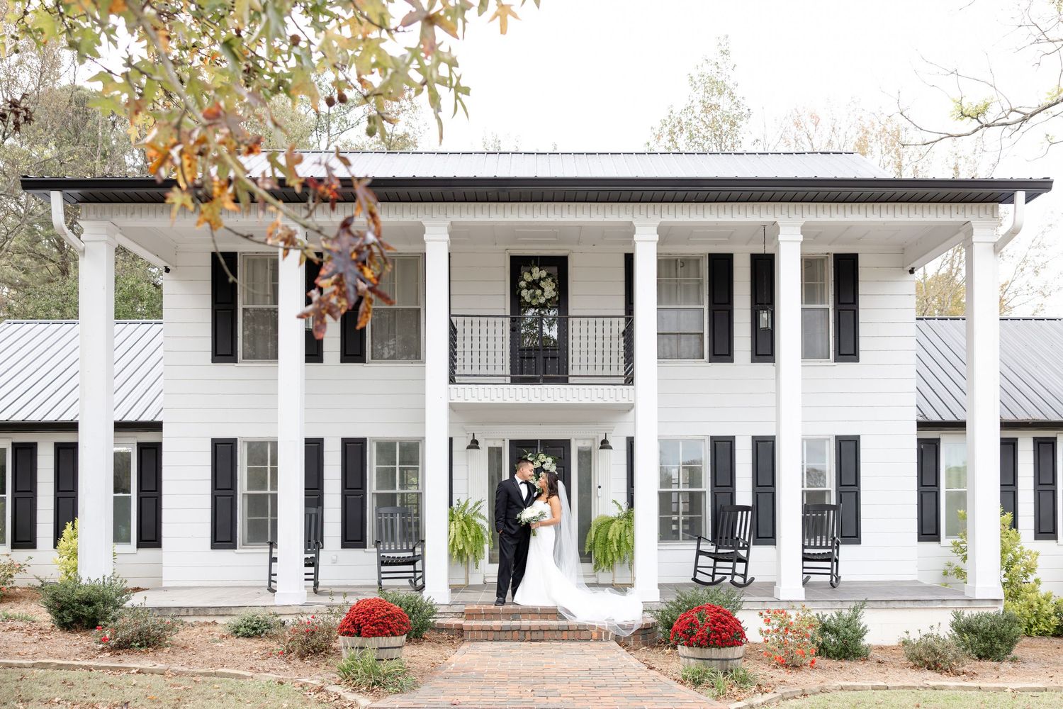 Elegant wedding at The Upton House in Guntersville, Alabama featuring a joyful bride and groom and timeless southern elegance.