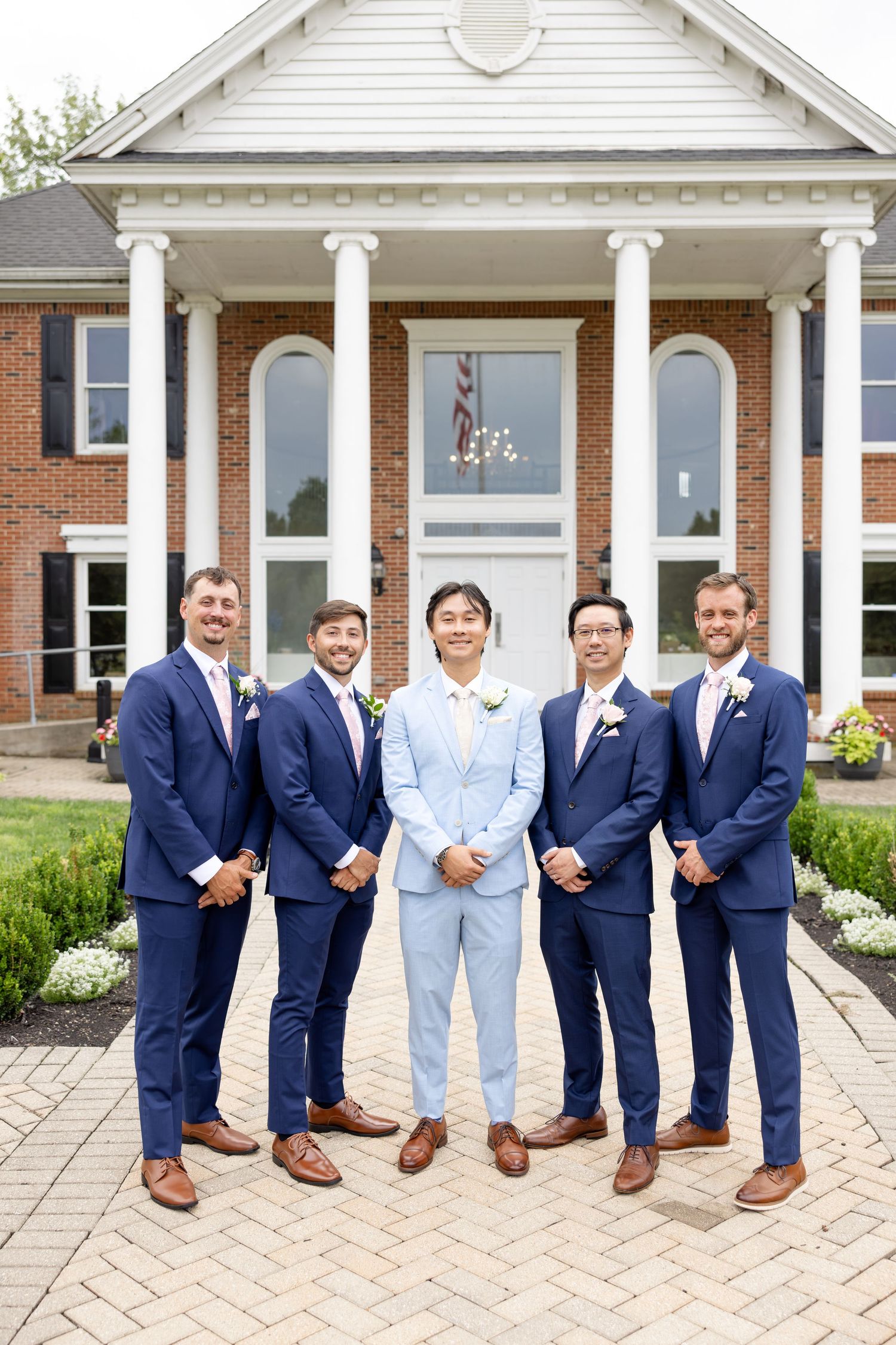 Light and airy wedding photography of a newly married couple at The Estate at Sunset Farm in Bellbrook, Ohio, by Julia and Sean Photography