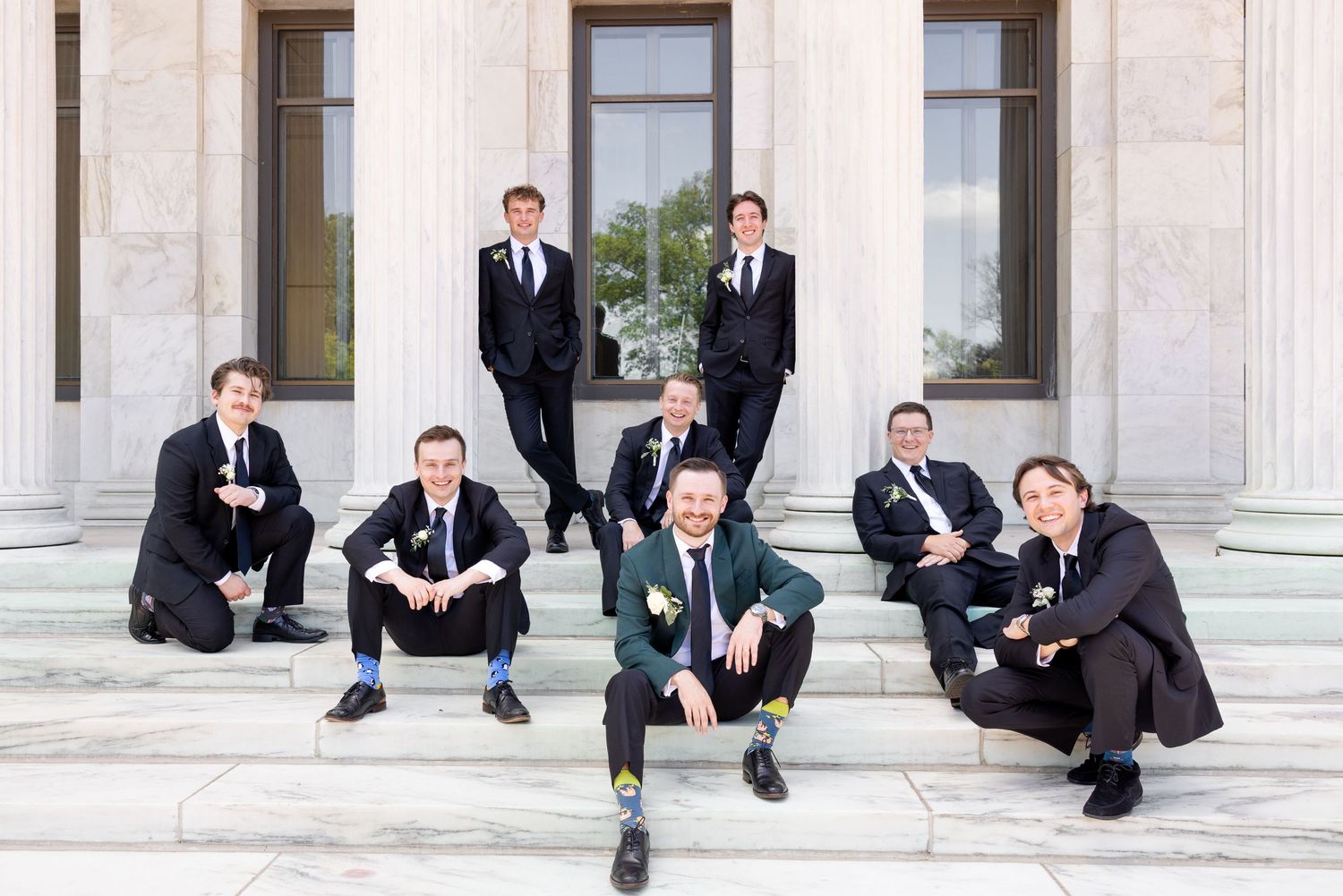 Bride and groom portraits at the Toledo Museum of Art before a Toledo Zoo wedding in Toledo, Ohio photographed by Julia & Sean Photography