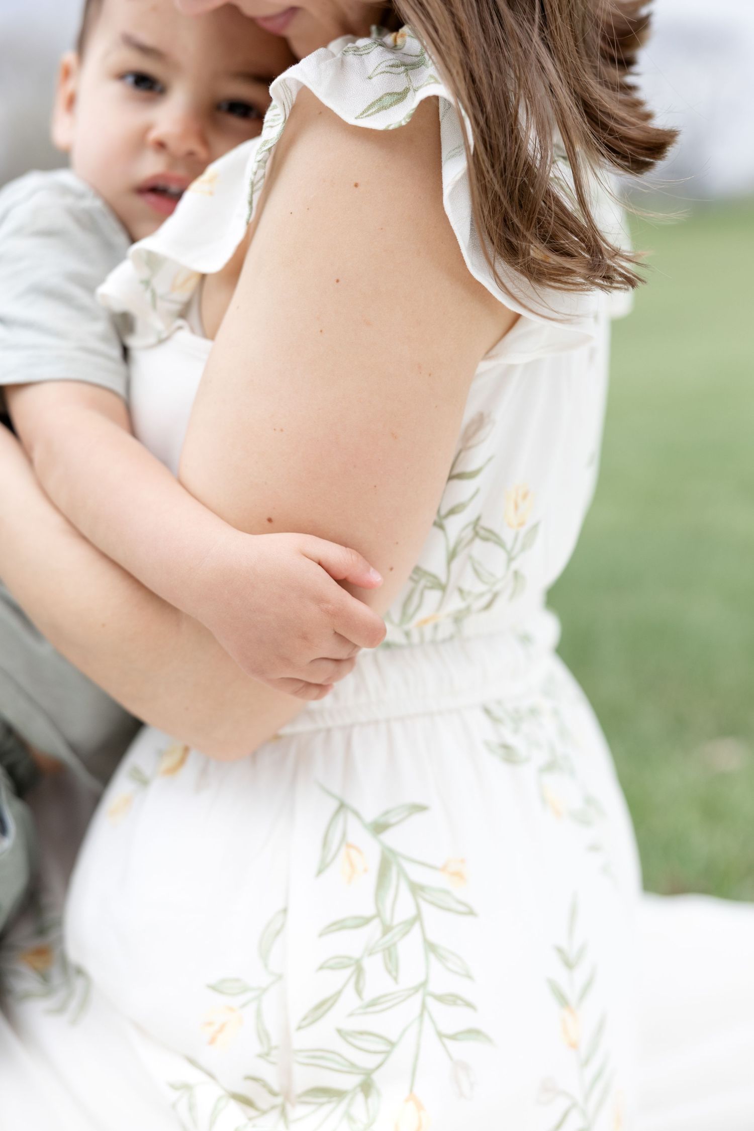 Joyful motherhood photos at Carillon Park in Dayton Ohio captured by Julia and Sean Photography during a soft spring day