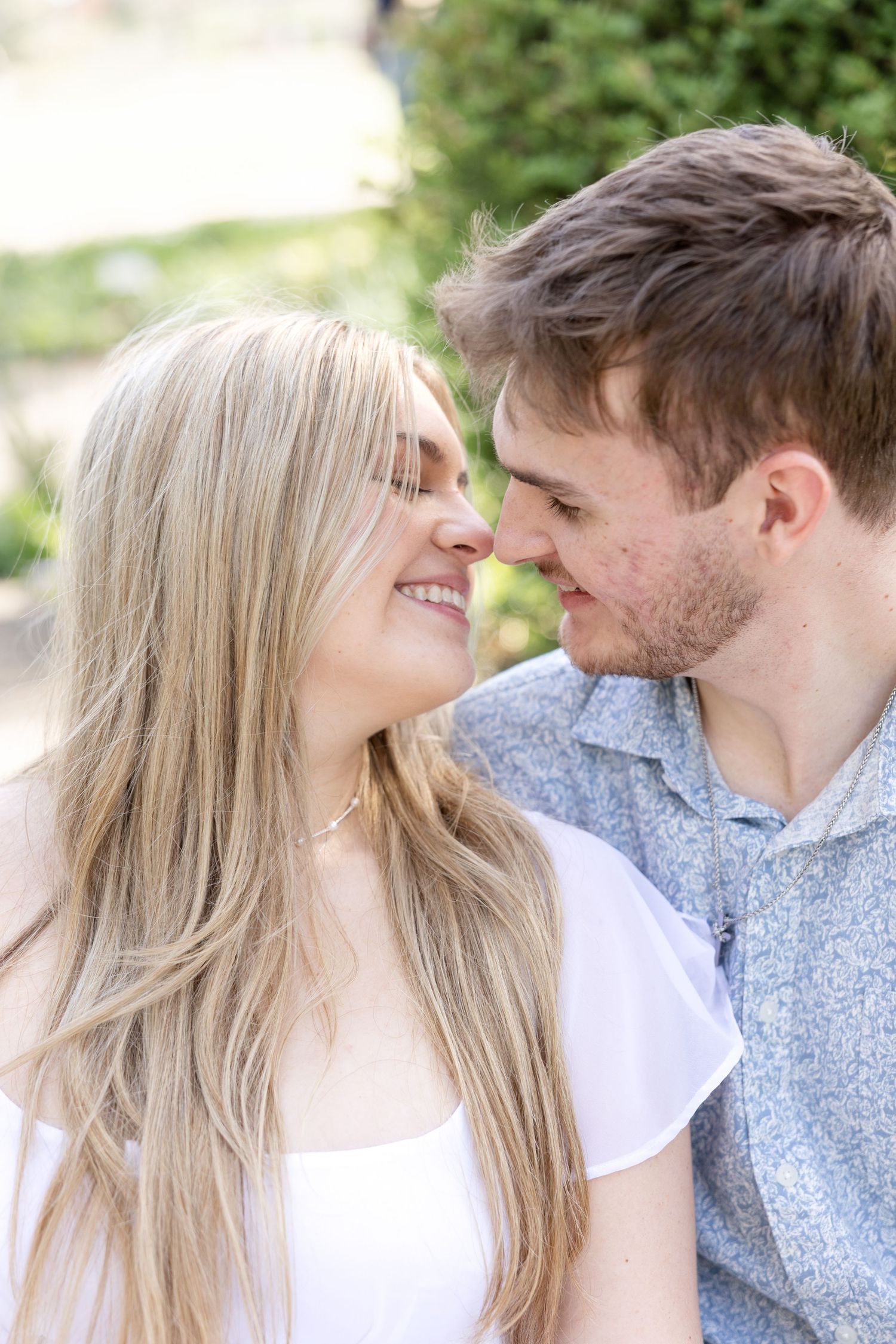 Cincinnati engagement session at Ault Park with light and airy style, capturing joyful, natural moments in a spring park setting