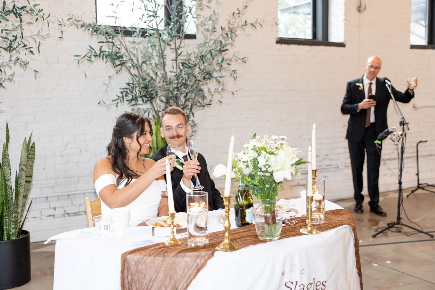 Wedding reception at Flat 51 in downtown Columbus, Ohio, featuring elegant reception details, heartfelt moments, and joyful celebration.