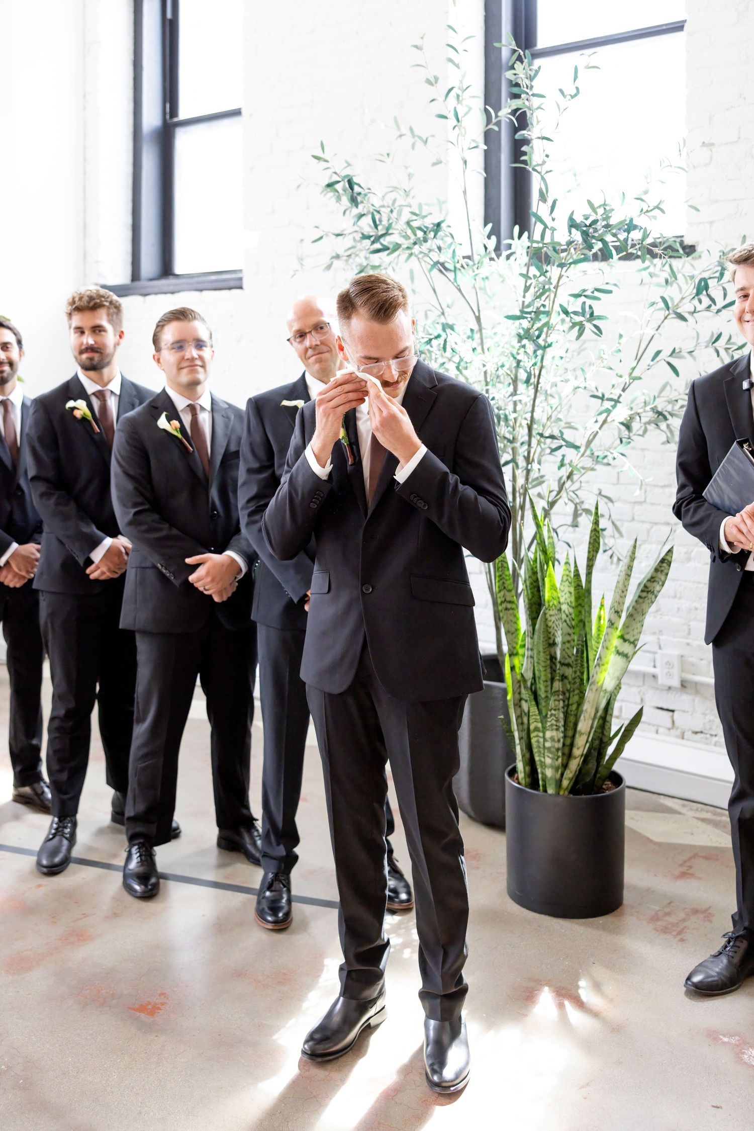 Bride and groom celebrating their Flat 51 wedding in downtown Columbus, Ohio, captured with timeless, light and airy wedding photography.