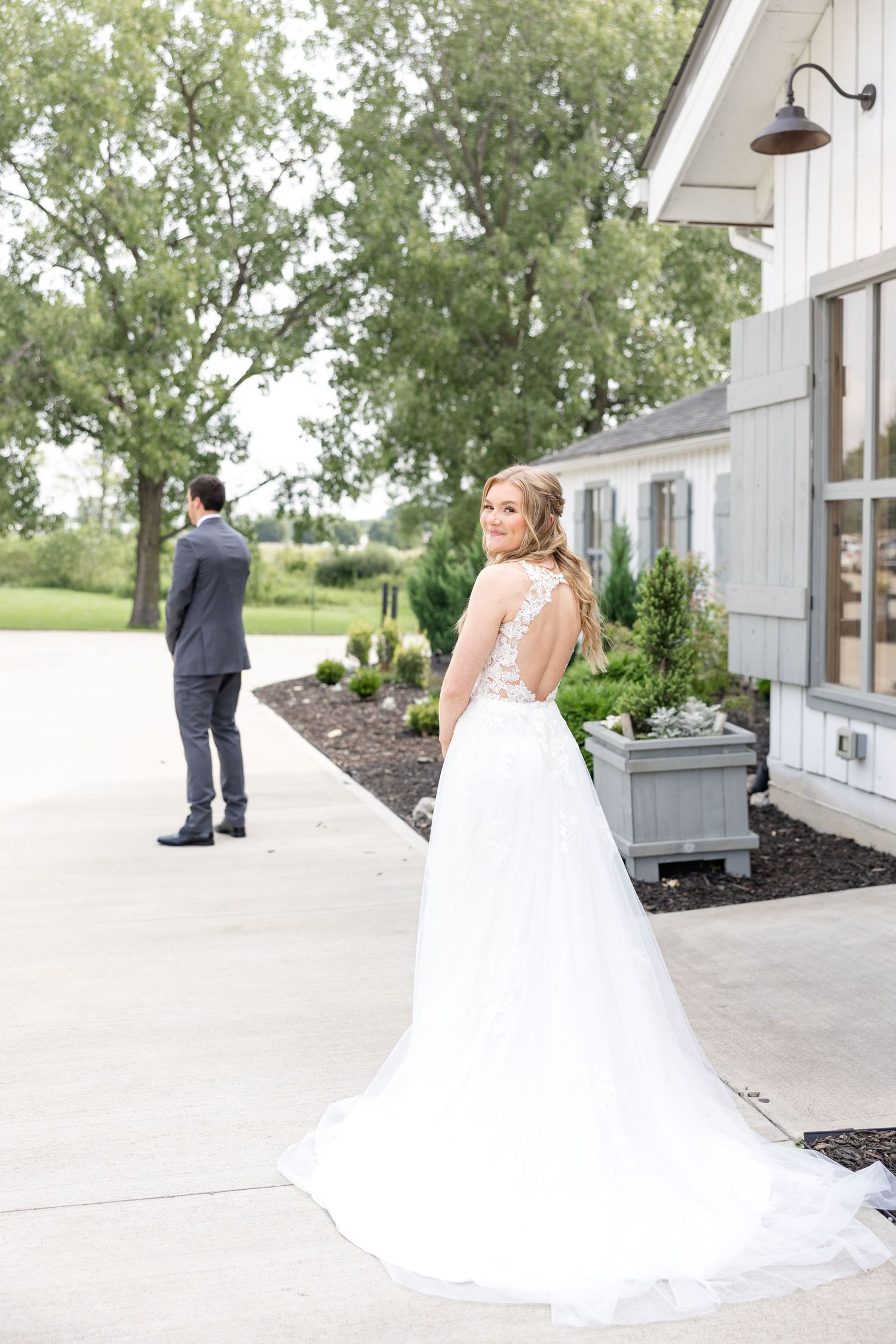 Timeless wedding photography at The Bicentennial Barn in Dayton, Ohio, featuring a joyful Cedarville University couple on their wedding day.