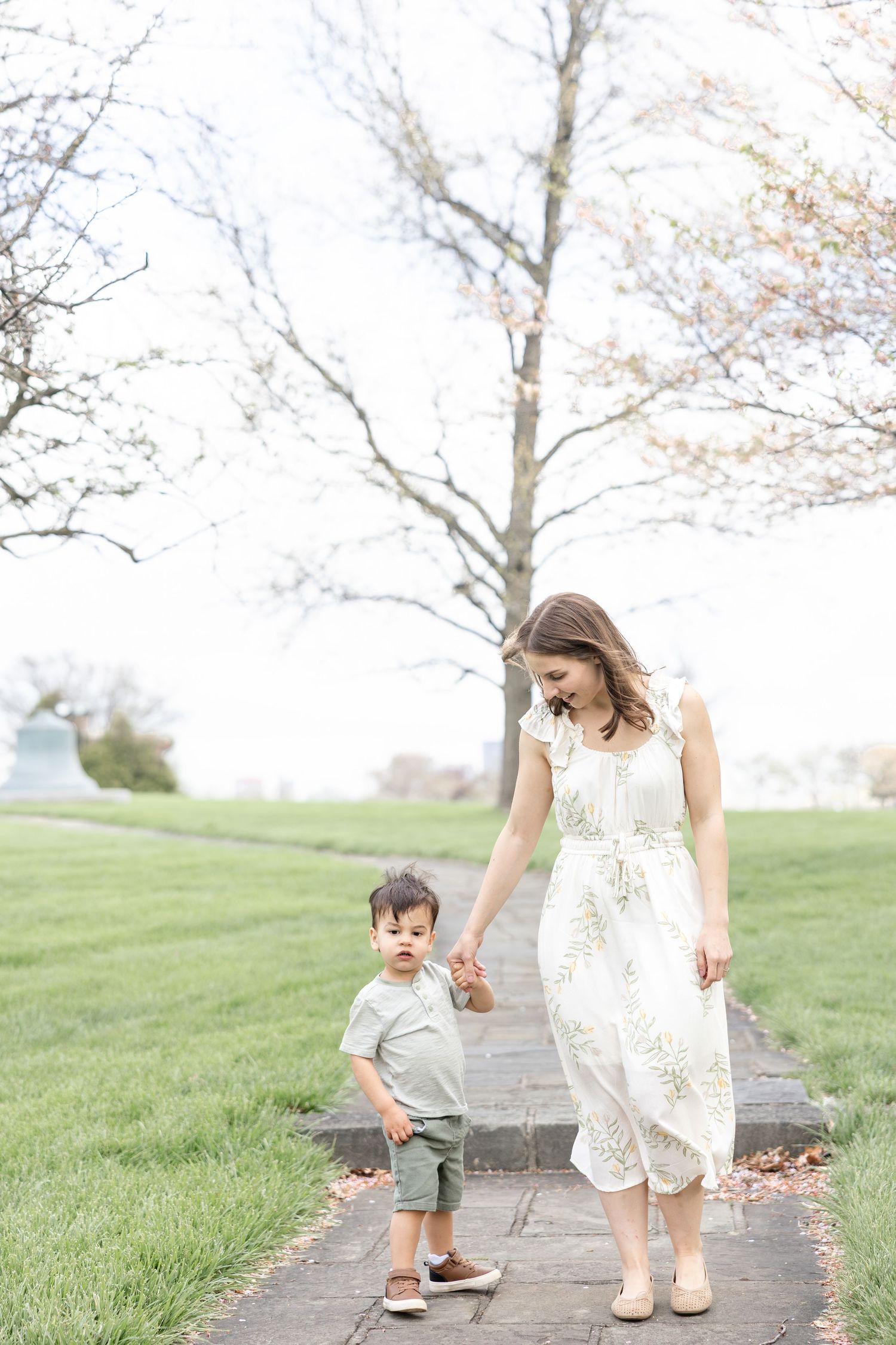 Mother holding her baby during a timeless motherhood session at Carillon Park in Dayton Ohio with Julia and Sean Photography