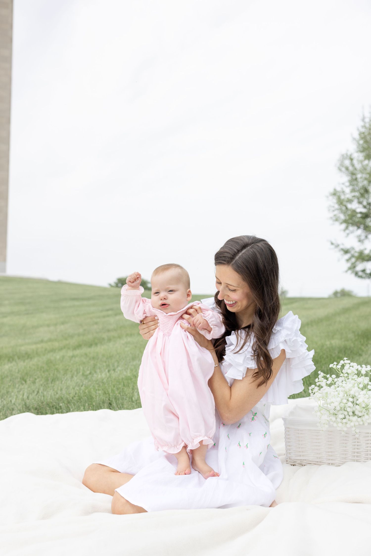 Joyful motherhood photos at Carillon Park in Dayton Ohio captured by Julia and Sean Photography during a soft spring day