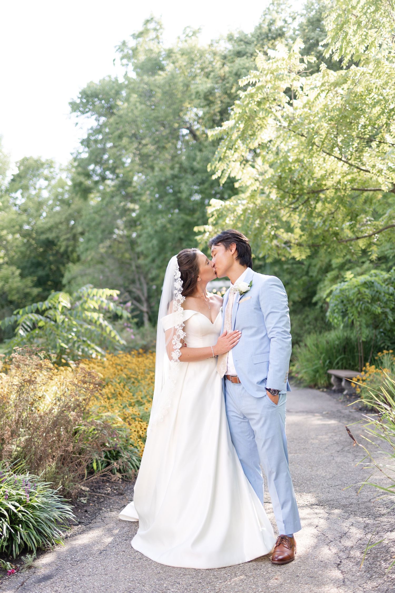 Light and airy wedding photography of a newly married couple at The Estate at Sunset Farm in Bellbrook, Ohio, by Julia and Sean Photography