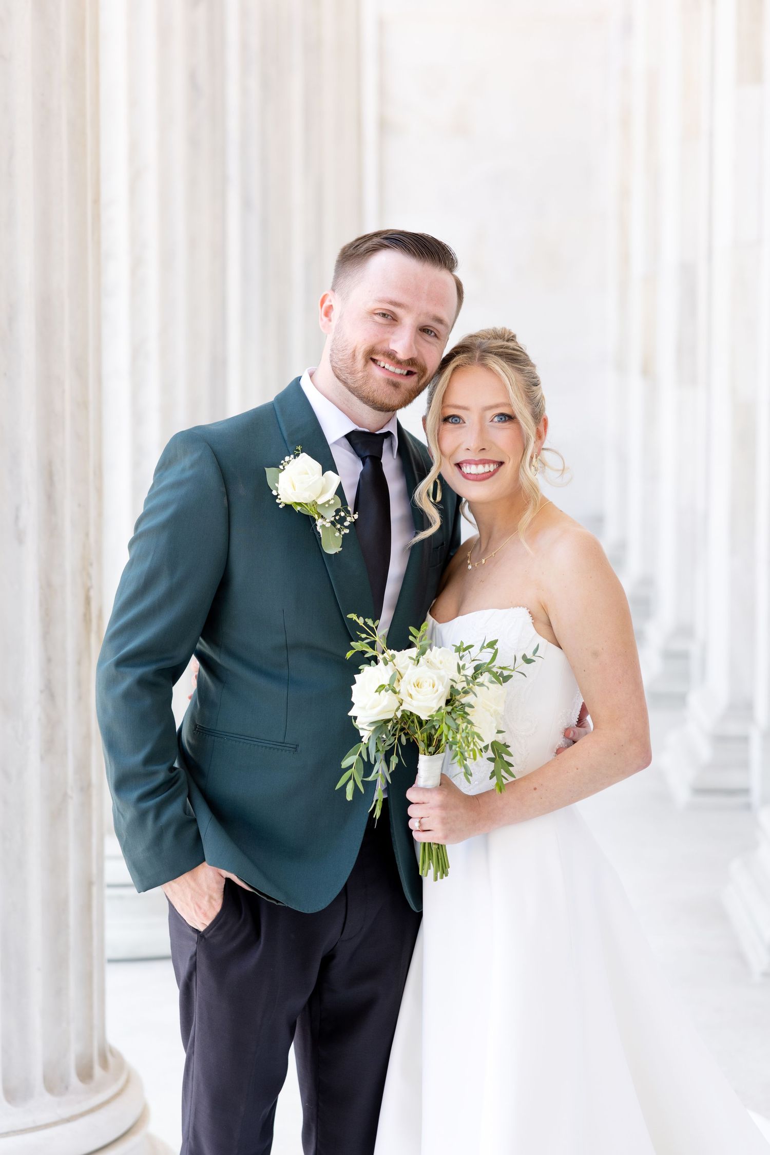 Bride and groom portraits at the Toledo Museum of Art before a Toledo Zoo wedding in Toledo, Ohio photographed by Julia & Sean Photography