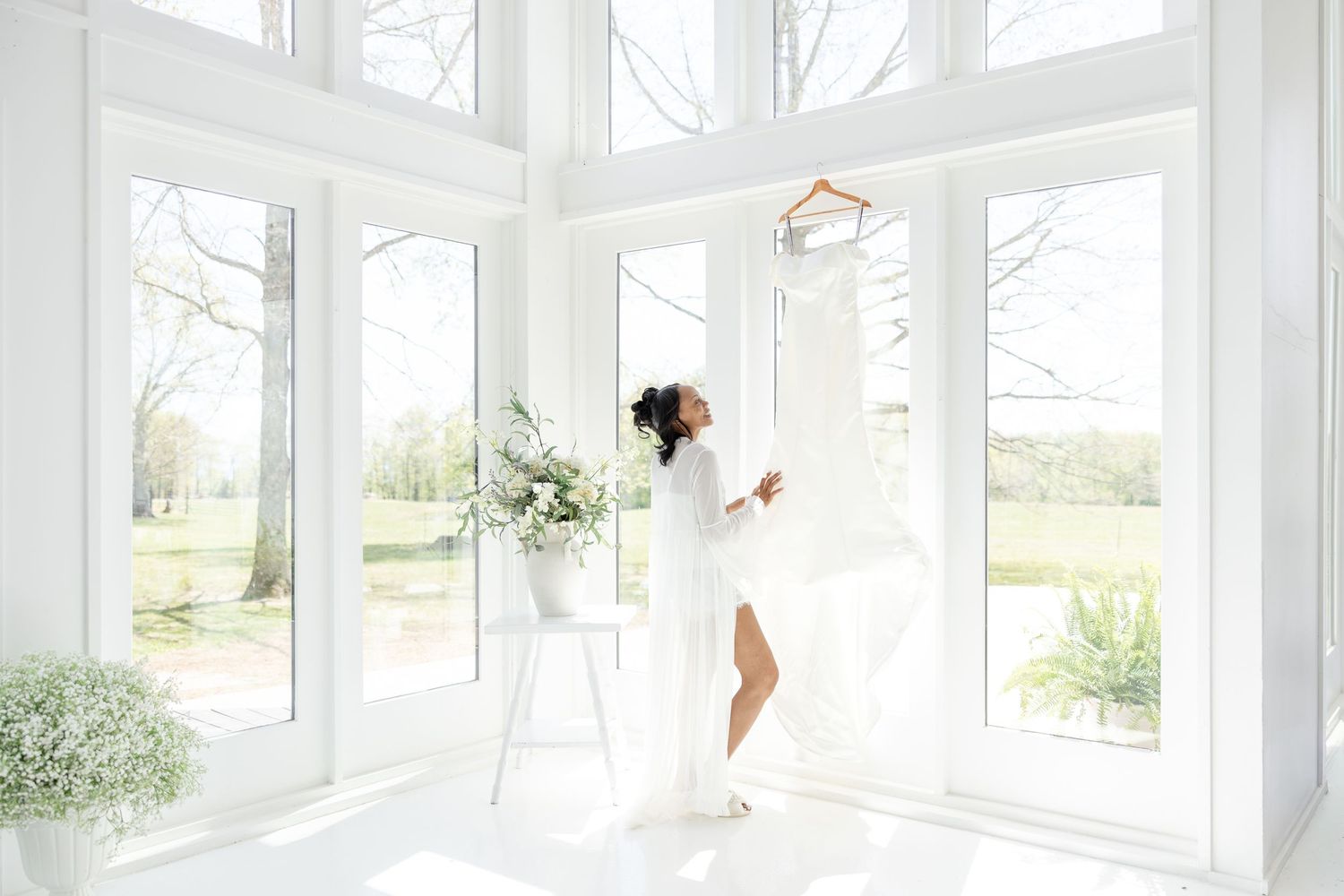 Light and airy wedding photos at The Glass House near Huntsville, Alabama capturing joyful, timeless moments of a bride and groom