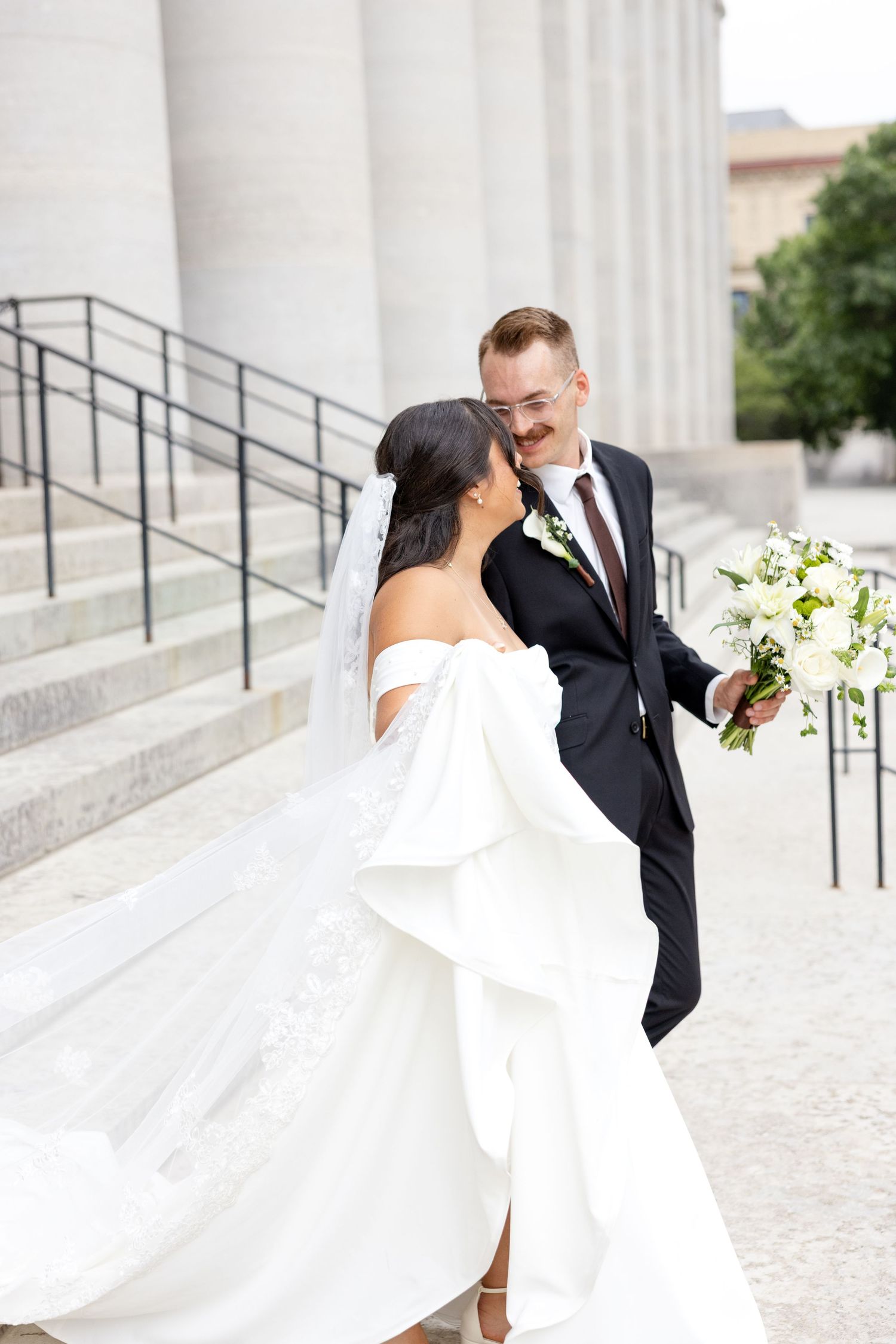 Bride and groom portraits at the Ohio Statehouse in downtown Columbus, Ohio, captured with timeless, light and airy wedding photography.