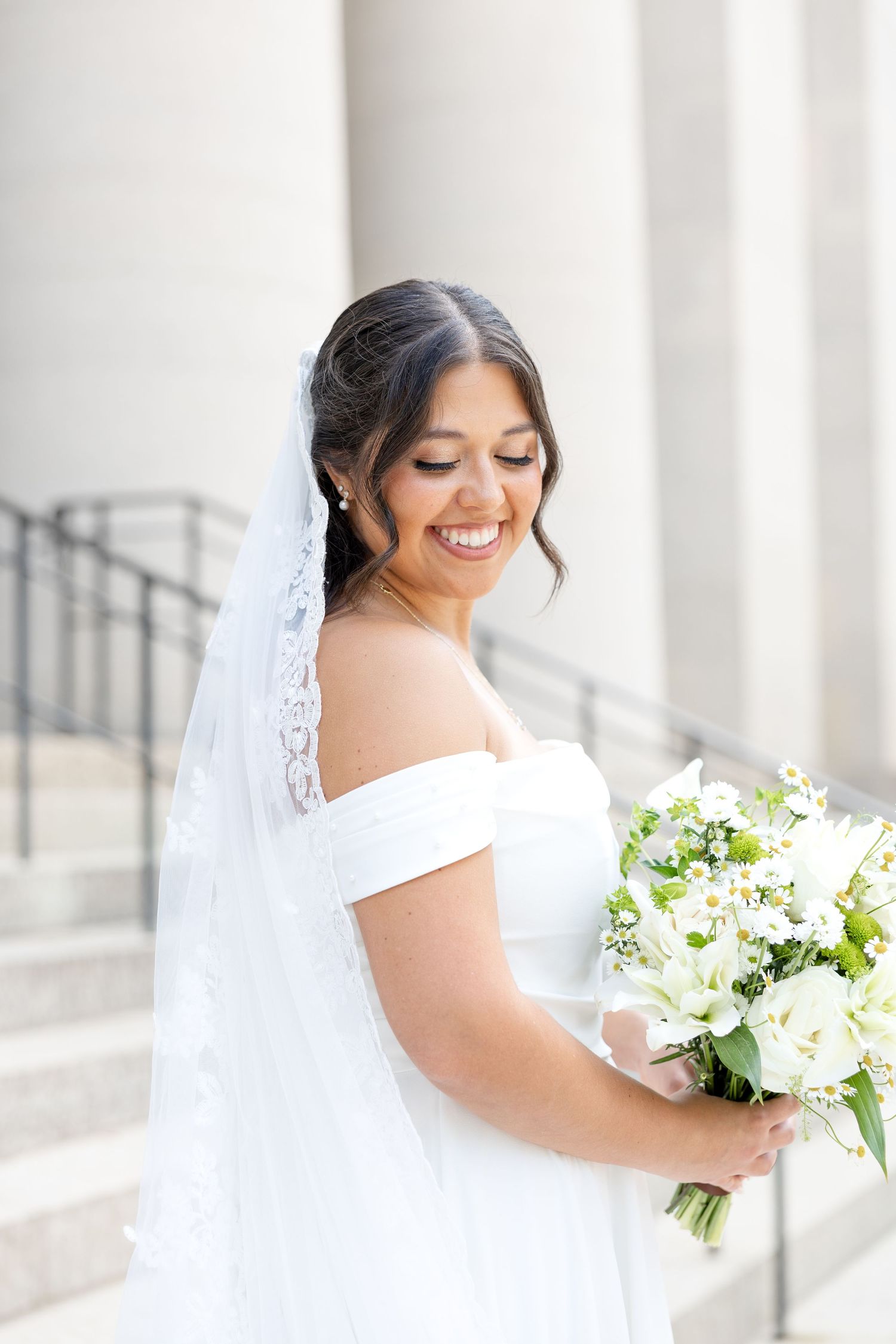Bride and groom celebrating their Flat 51 wedding in downtown Columbus, Ohio, captured with timeless, light and airy wedding photography.