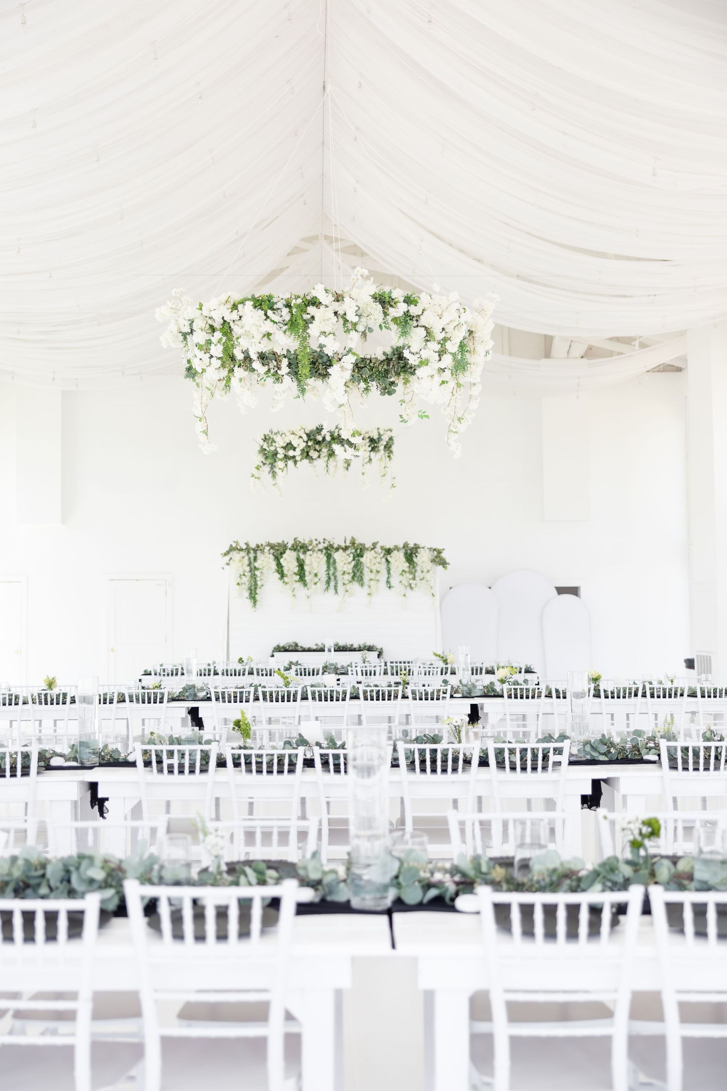 Light and airy wedding photos at The Glass House near Huntsville, Alabama capturing joyful, timeless moments of a bride and groom
