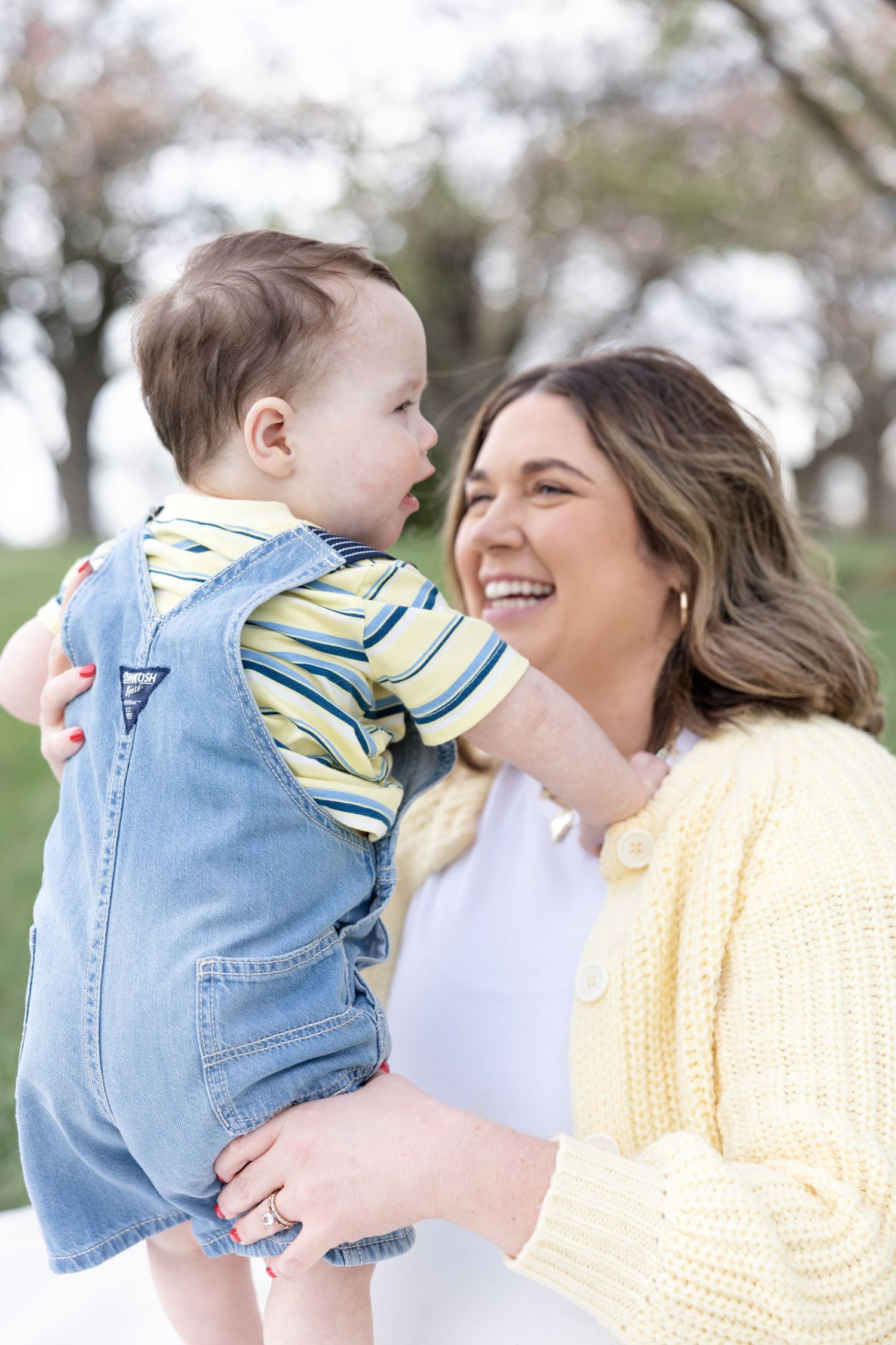 Mother holding her baby during a timeless motherhood session at Carillon Park in Dayton Ohio with Julia and Sean Photography