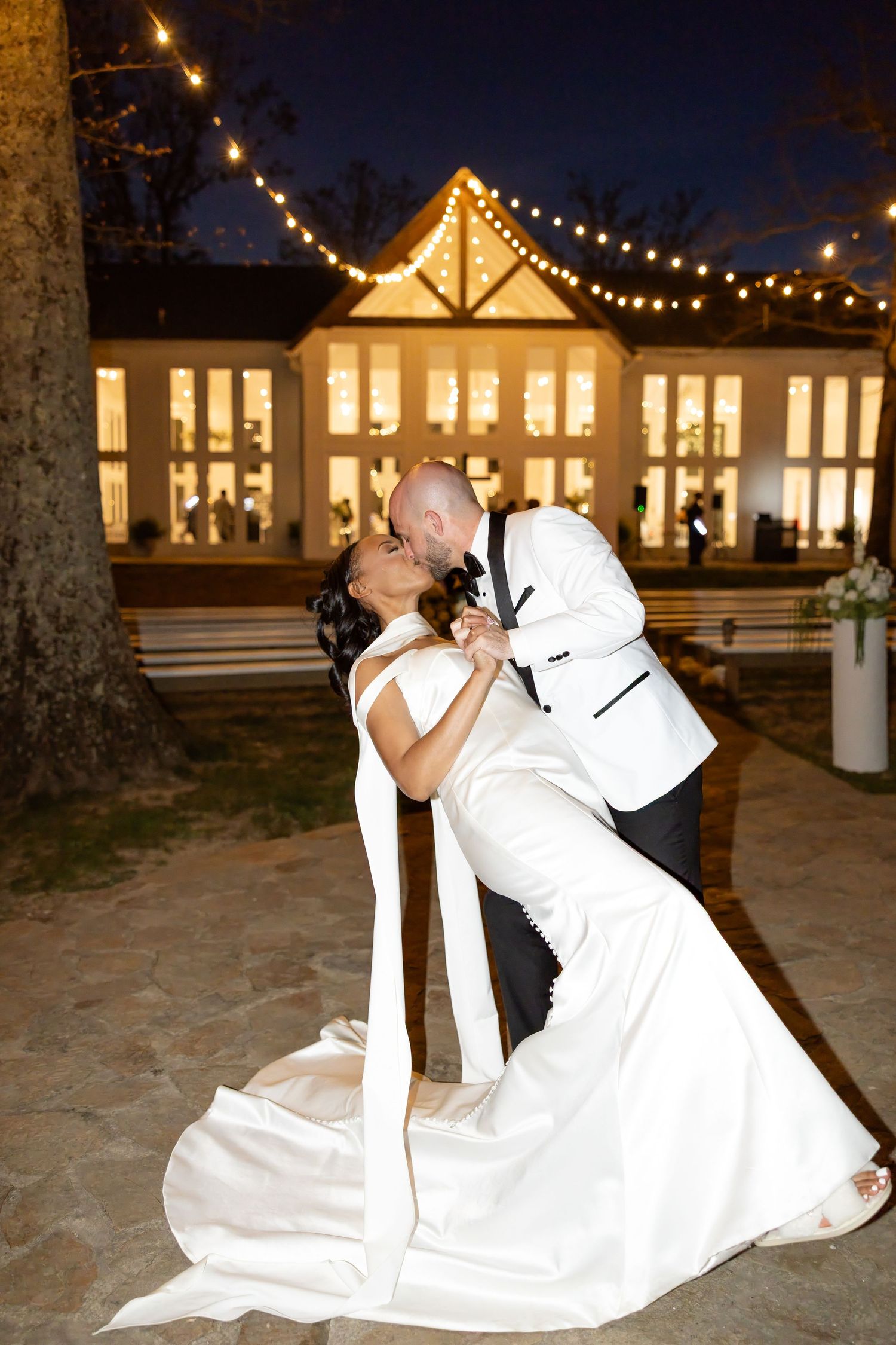 Light and airy wedding photos at The Glass House near Huntsville, Alabama capturing joyful, timeless moments of a bride and groom