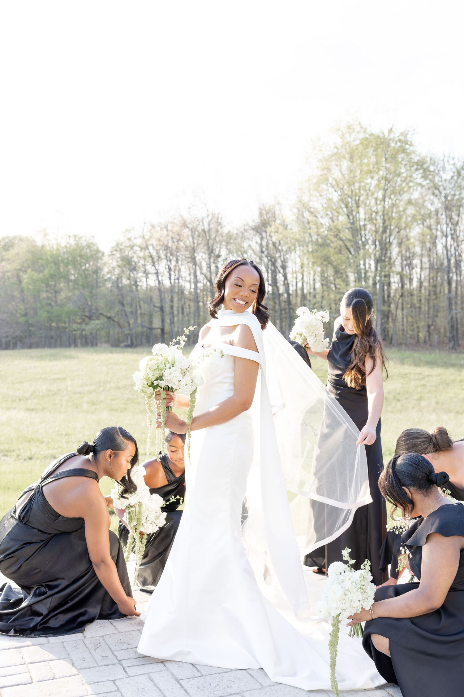 Light and airy wedding photos at The Glass House near Huntsville, Alabama capturing joyful, timeless moments of a bride and groom