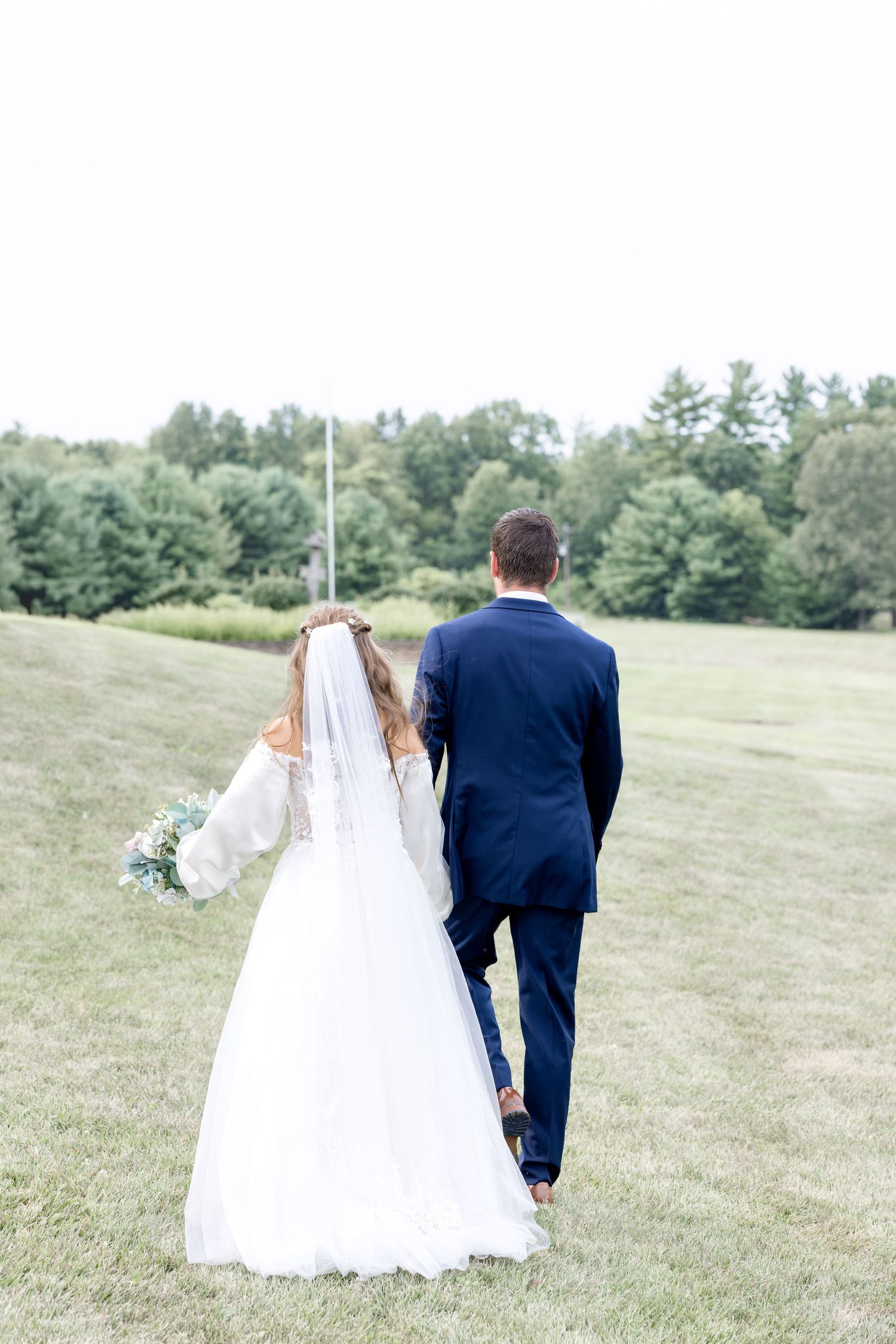 Romantic summer wedding in Northeast Ohio at Heartland on Heritage by Julia and Sean Photography, husband-and-wife wedding photographers.
