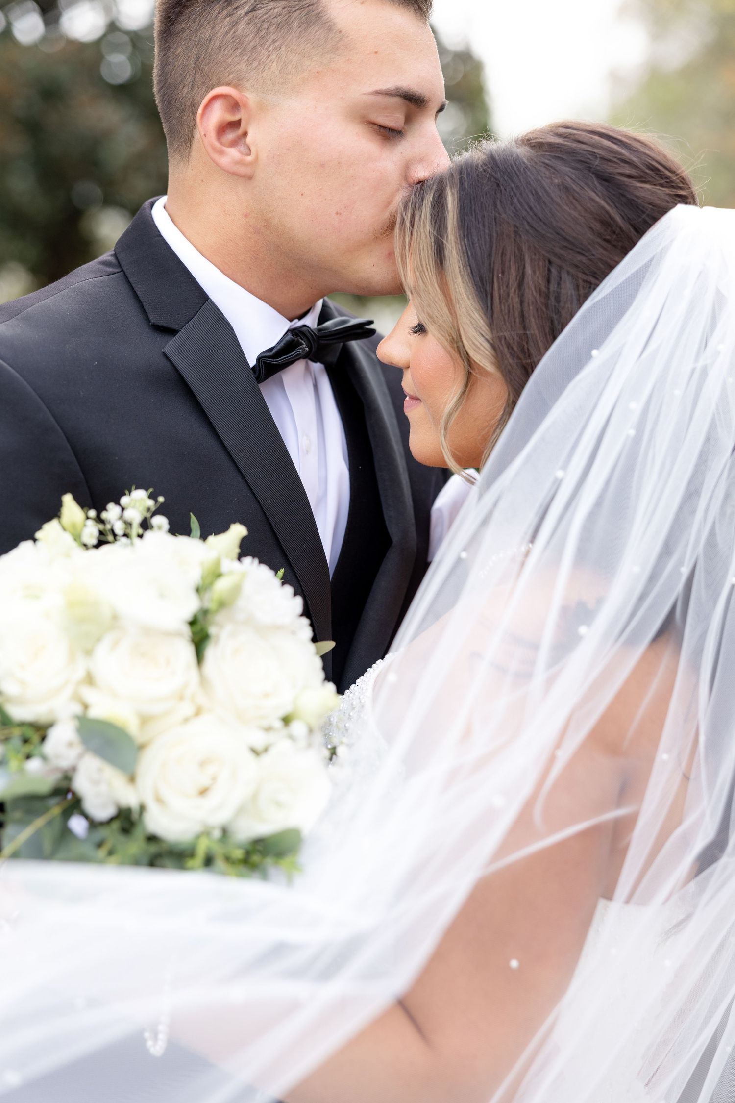 Elegant wedding at The Upton House in Guntersville, Alabama featuring a joyful bride and groom and timeless southern elegance.