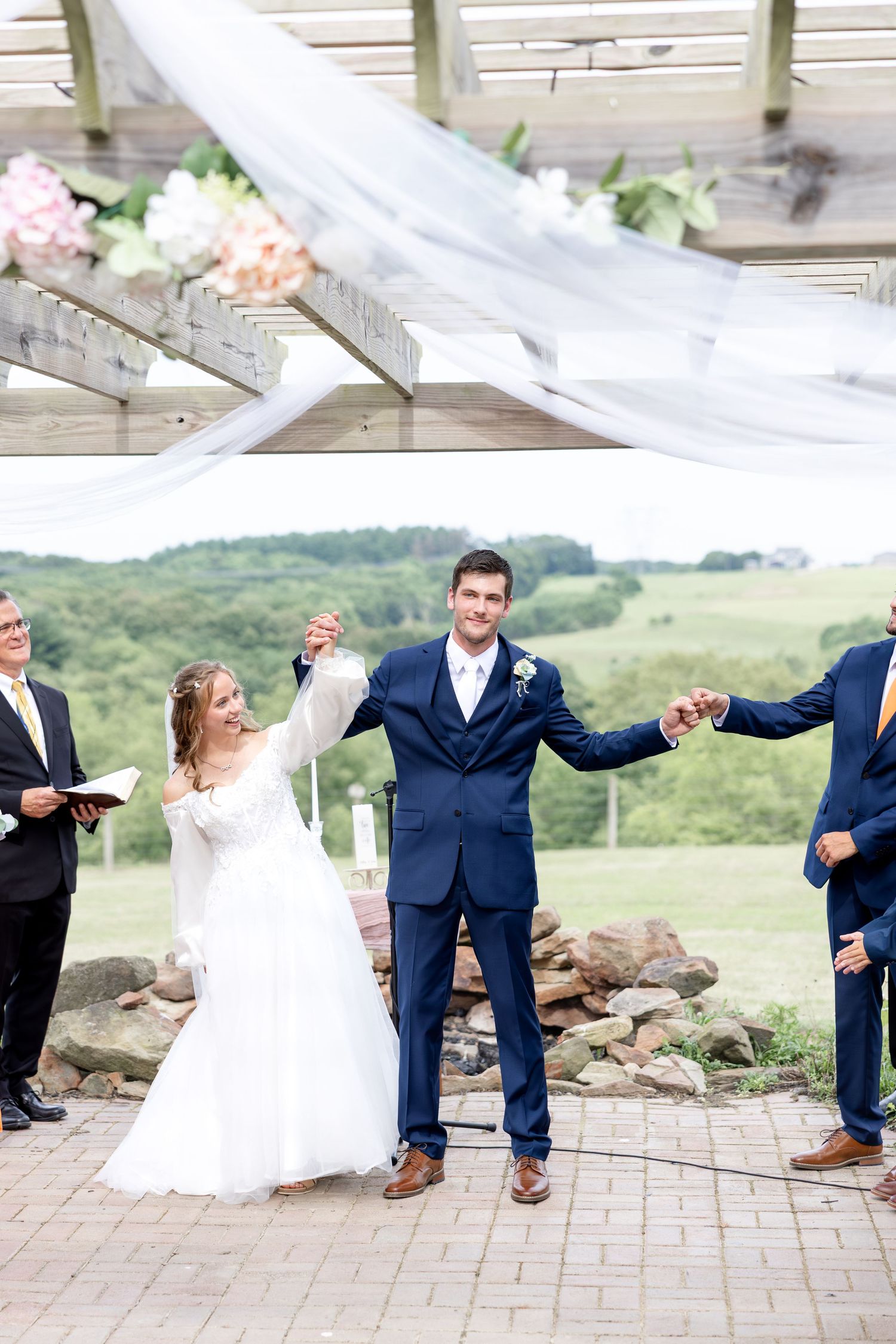 Romantic summer wedding in Northeast Ohio at Heartland on Heritage by Julia and Sean Photography, husband-and-wife wedding photographers.